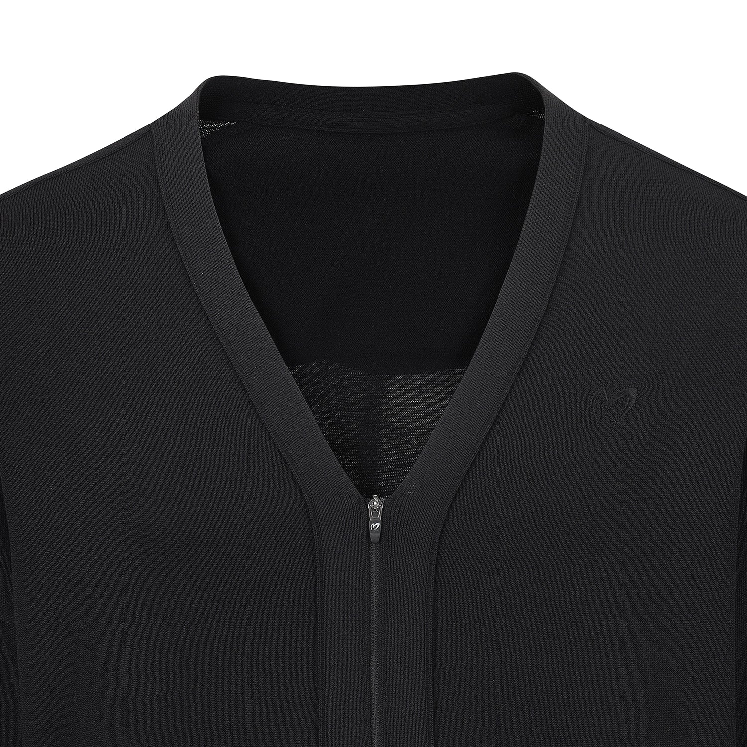 Close-up of a black zip-up vest with a V-neck collar, featuring a subtle tonal heart logo on the left chest.