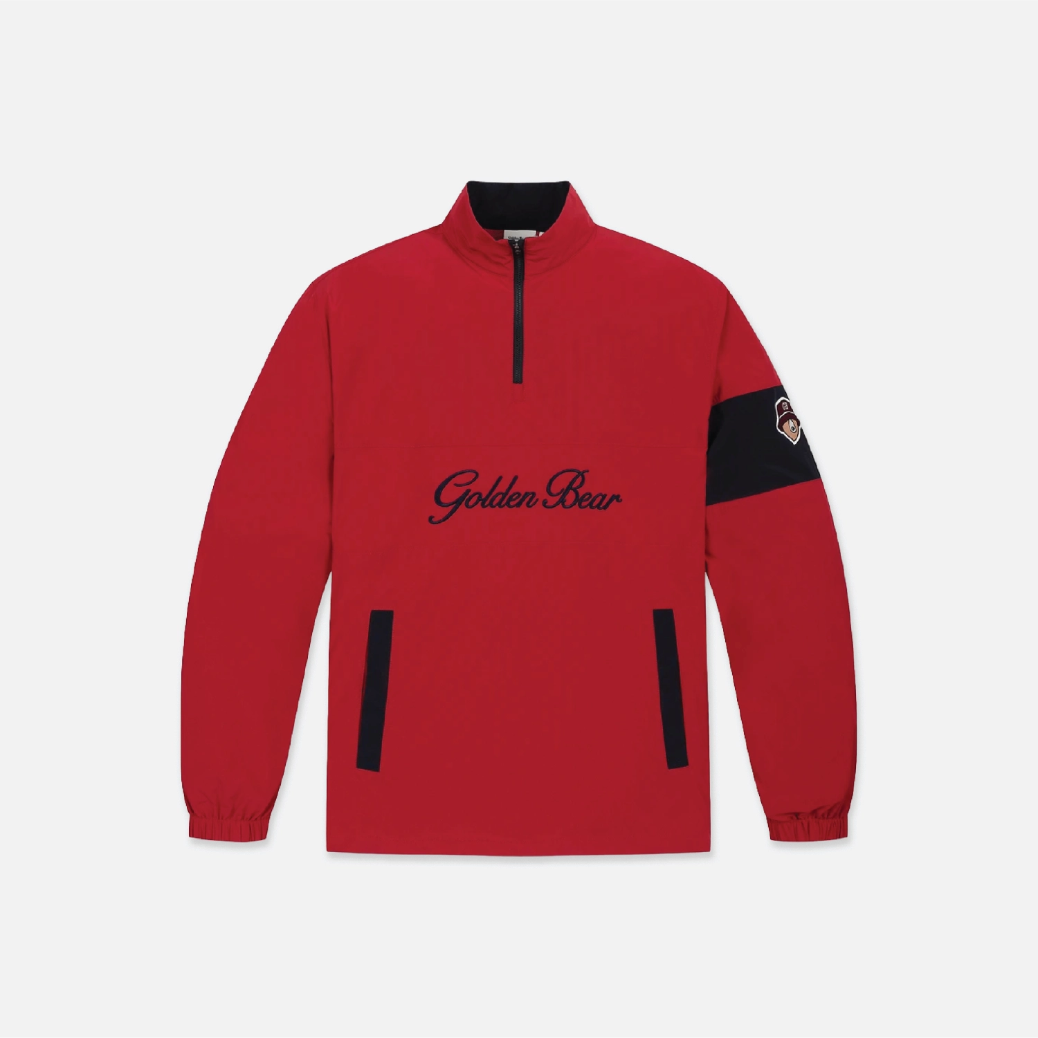A red half-zip pullover jacket with black accents, featuring 'Golden Bear' embroidered in black script across the chest and a black armband patch on the right sleeve, shown against a light gray background.