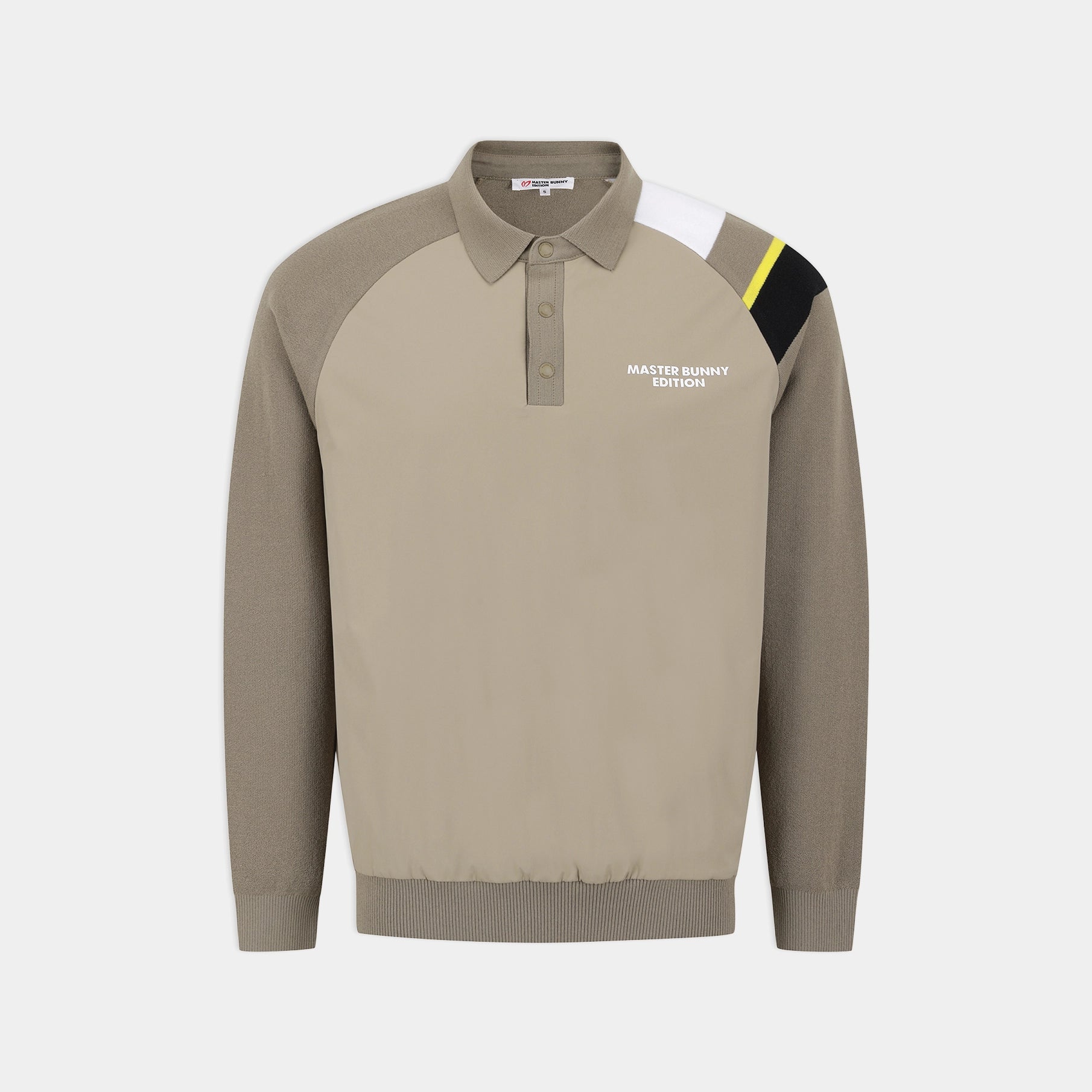 A long-sleeve polo-style knit sweater in taupe and beige with color-blocked shoulder details in white, black, and yellow, featuring 'MASTER BUNNY EDITION' text on the chest.