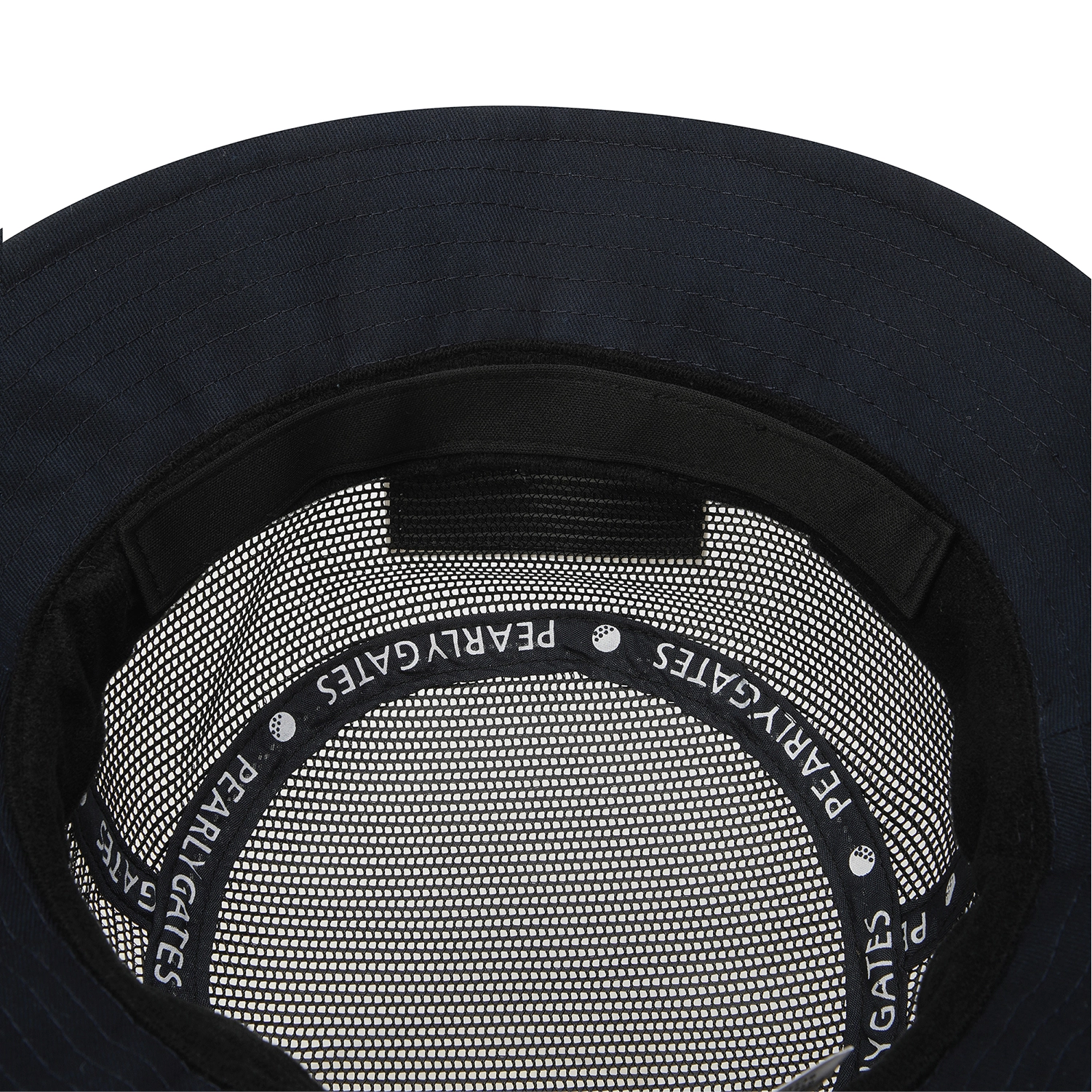 Close-up of the inside of a dark navy or black bucket hat, showing the mesh lining and a black elastic band printed with the brand name 'PEARLY GATES'.