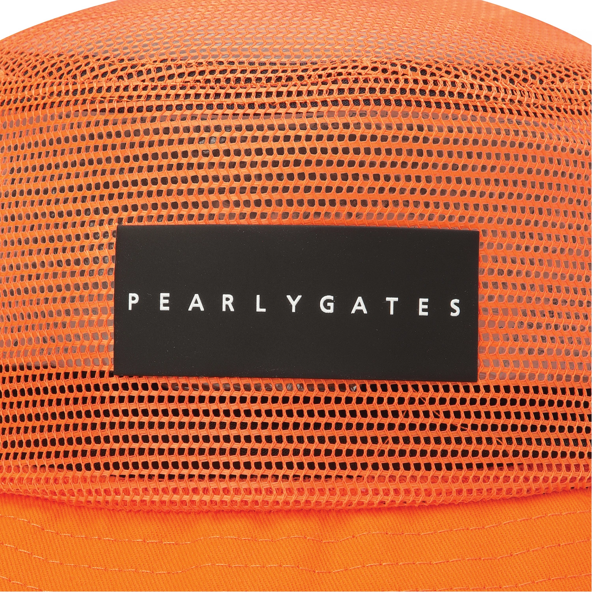 Close-up of a bright orange mesh cap with a black rectangular patch on the front reading PEARLYGATES in white text.