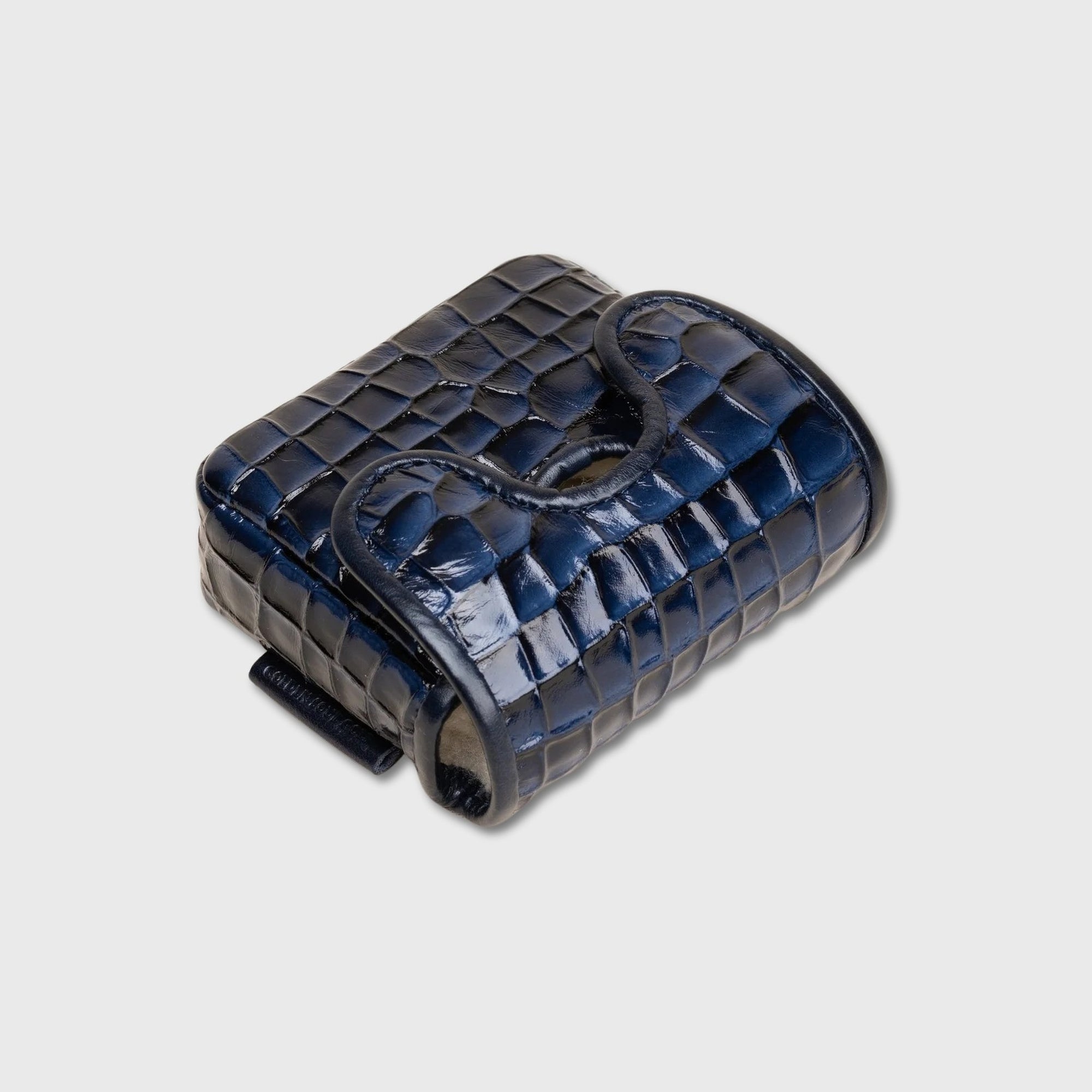 A dark navy blue crocodile-embossed leather ZT Spider putter cover with a glossy finish, shown on a light gray background.