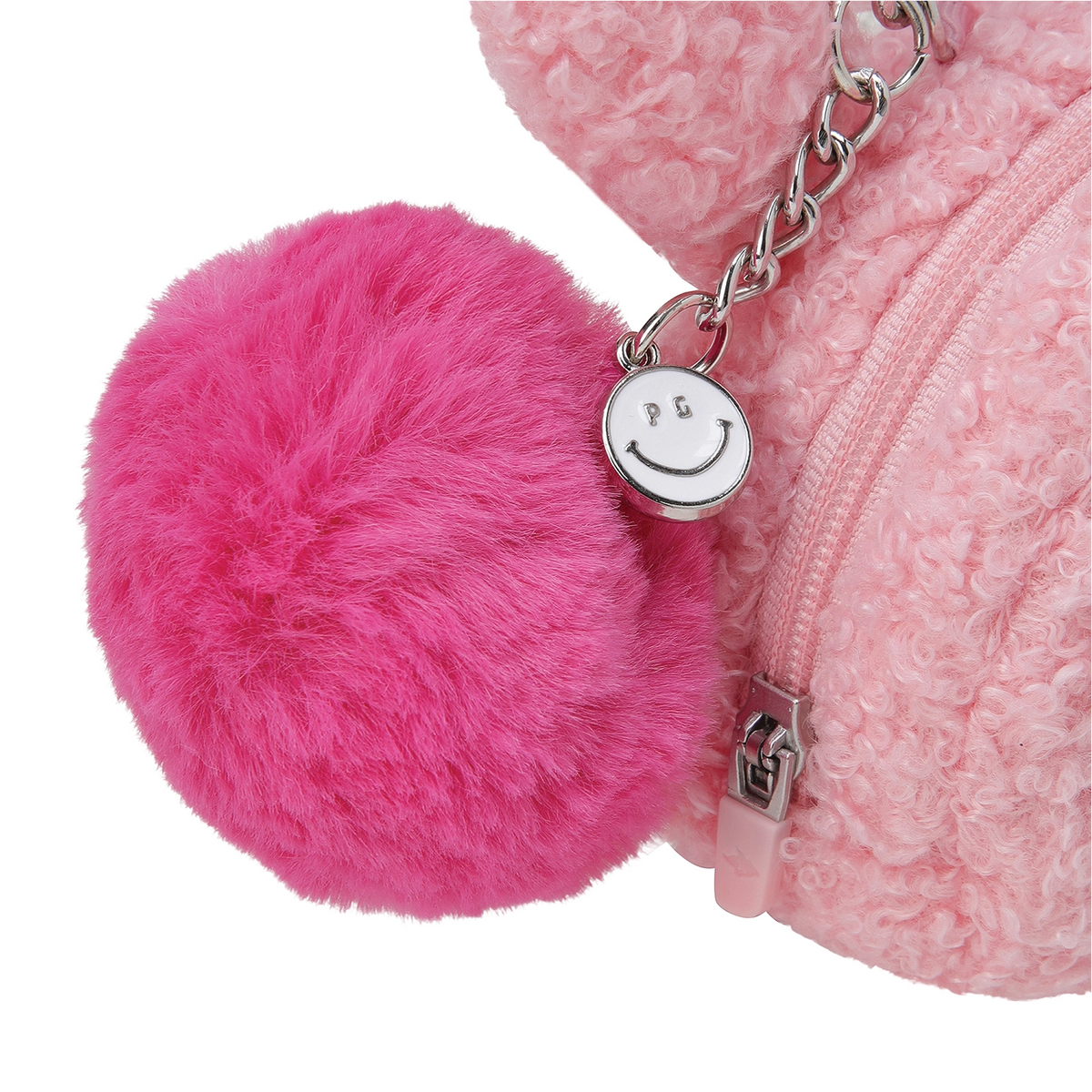 A close-up of a pink fuzzy pouch with a bright pink faux-fur pom-pom keychain charm and a silver-tone smiley-face metal tag attached to a chain.