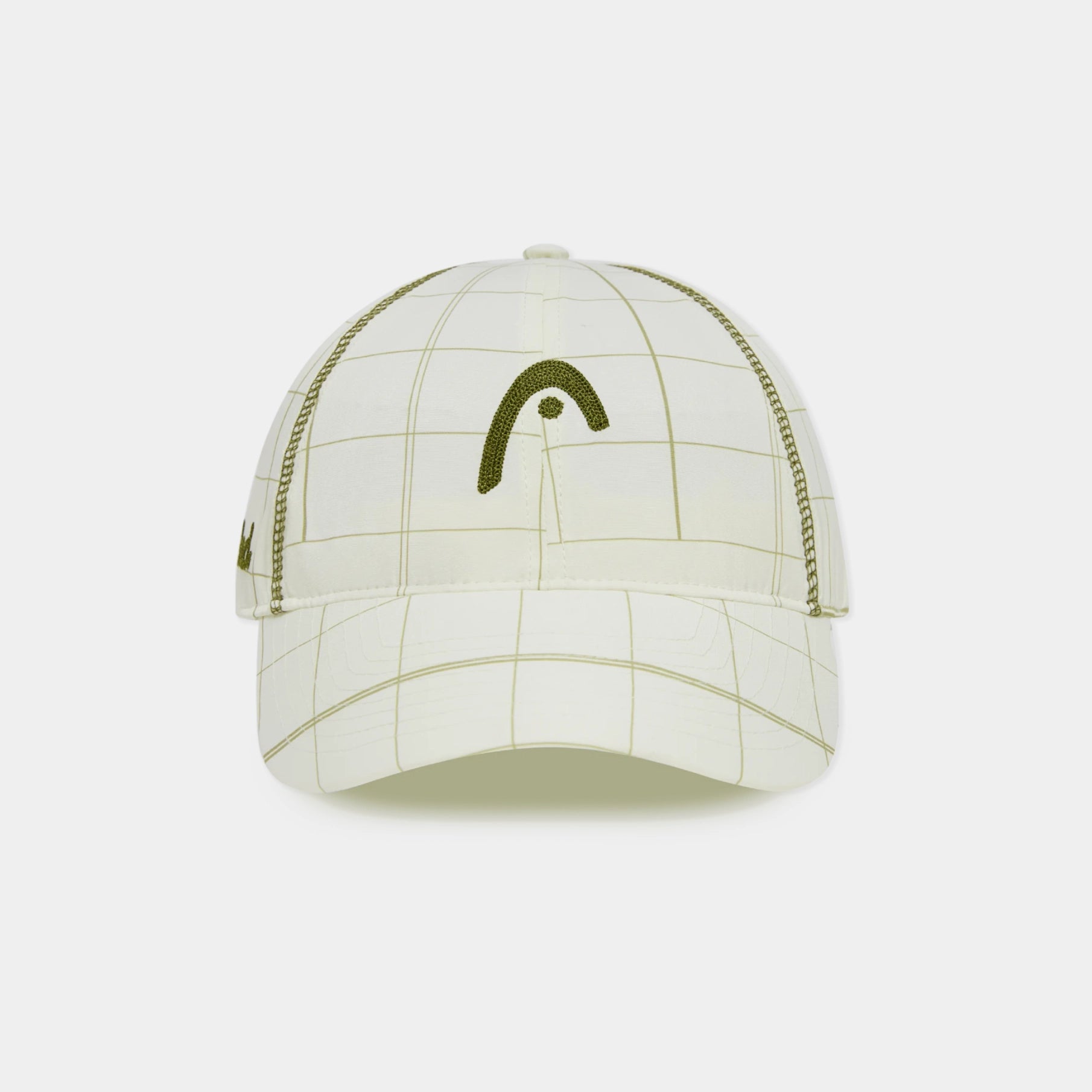A structured baseball cap in off-white with a thin olive green grid pattern and a large embroidered olive green headband logo on the front, set against a plain light gray background.
