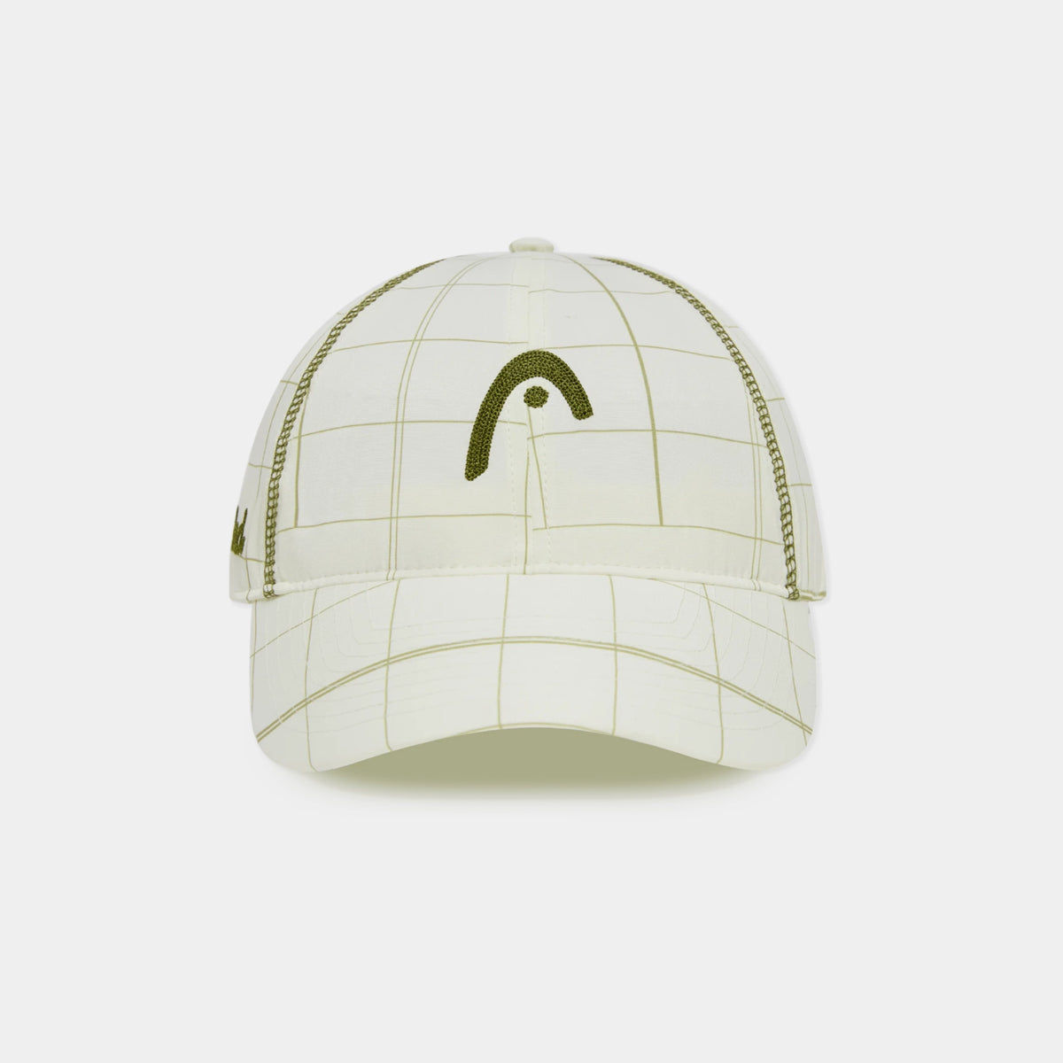 A structured baseball cap in off-white with a thin olive green grid pattern and a large embroidered olive green headband logo on the front, set against a plain light gray background.