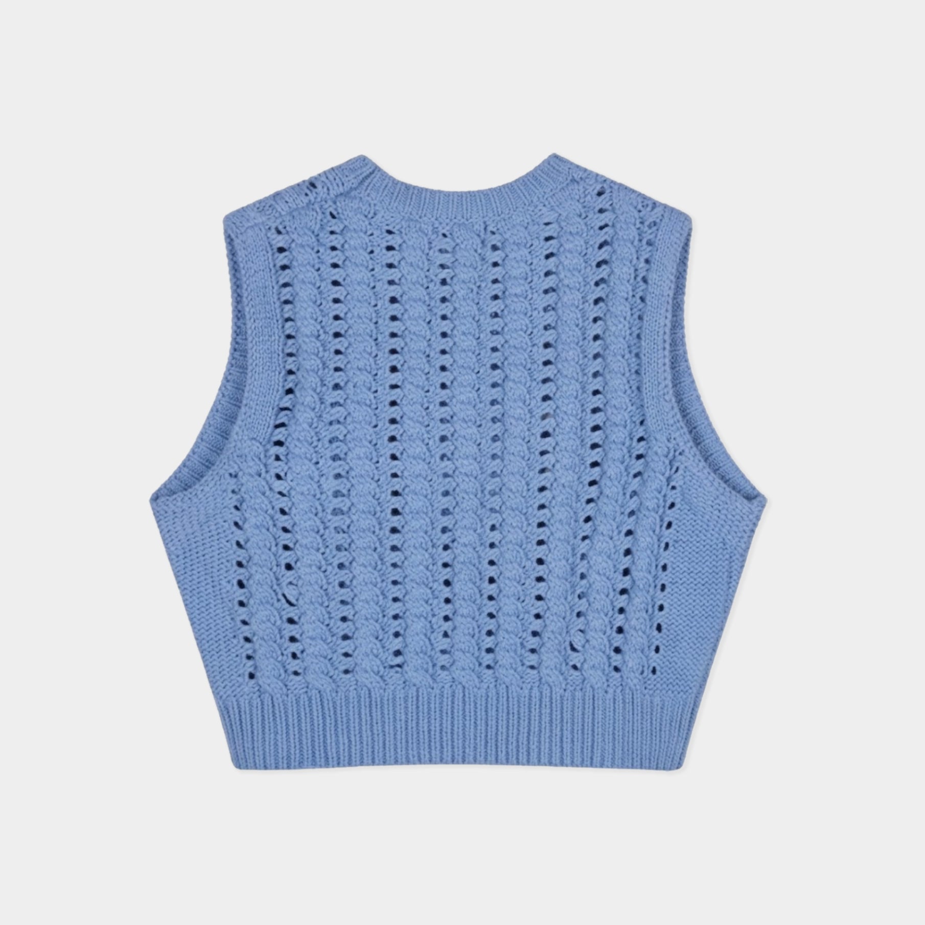 A light blue knit sleeveless vest with a textured openwork pattern, shown from the back on a light gray background.