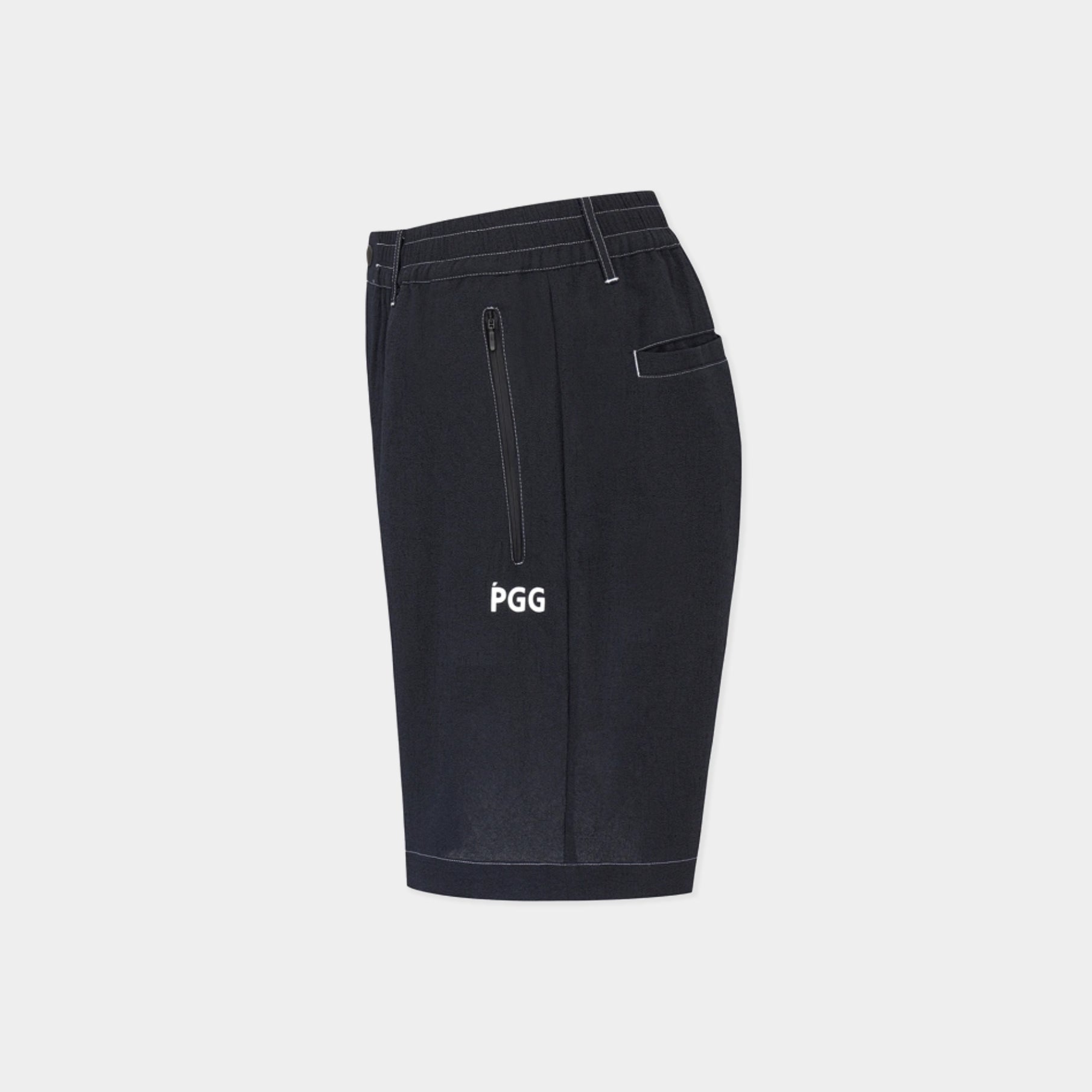 Black PGG shorts with a vertical zippered pocket and white logo print on the left leg, shown against a light gray background.
