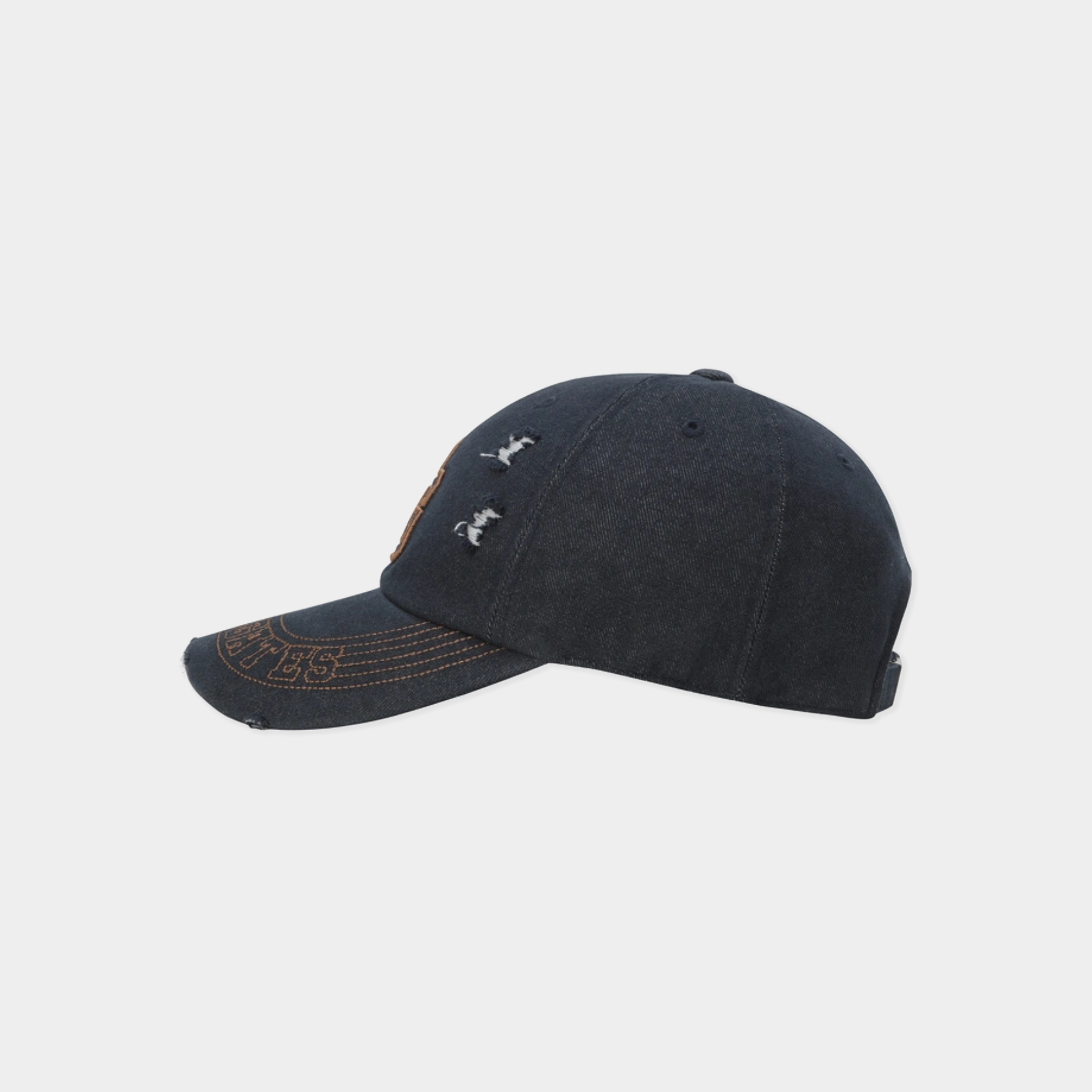Blue baseball cap with a logo on a light gray background