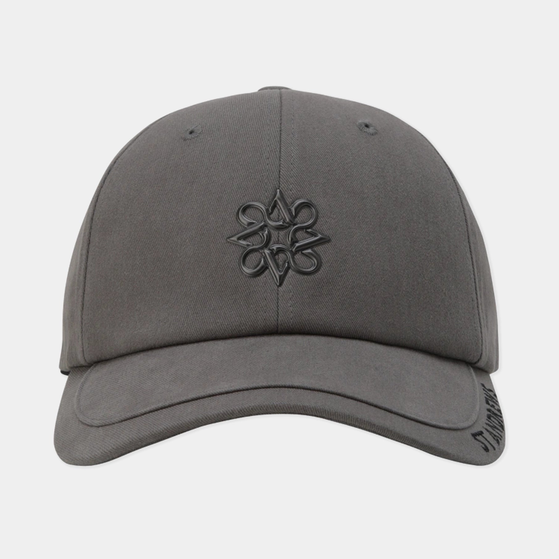 A dark gray baseball cap with a tonal black embroidered logo on the front, shown against a light gray background.