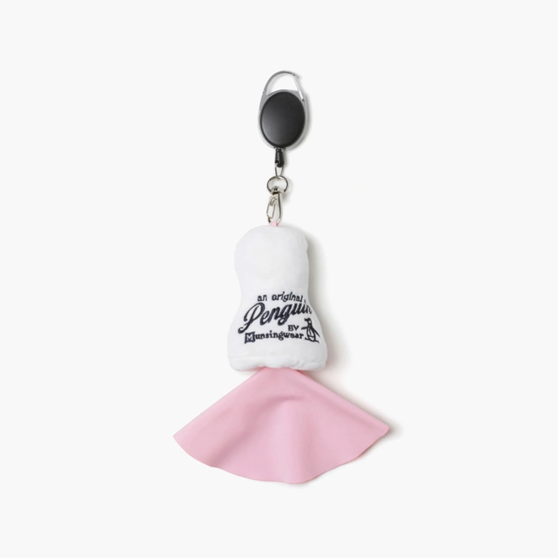A plush penguin keychain or bag clip featuring a white upper body with black embroidered text reading 'an original Penguin by Enchiltepa' and a pink flared tail, attached to a black retractable badge reel on a white background.