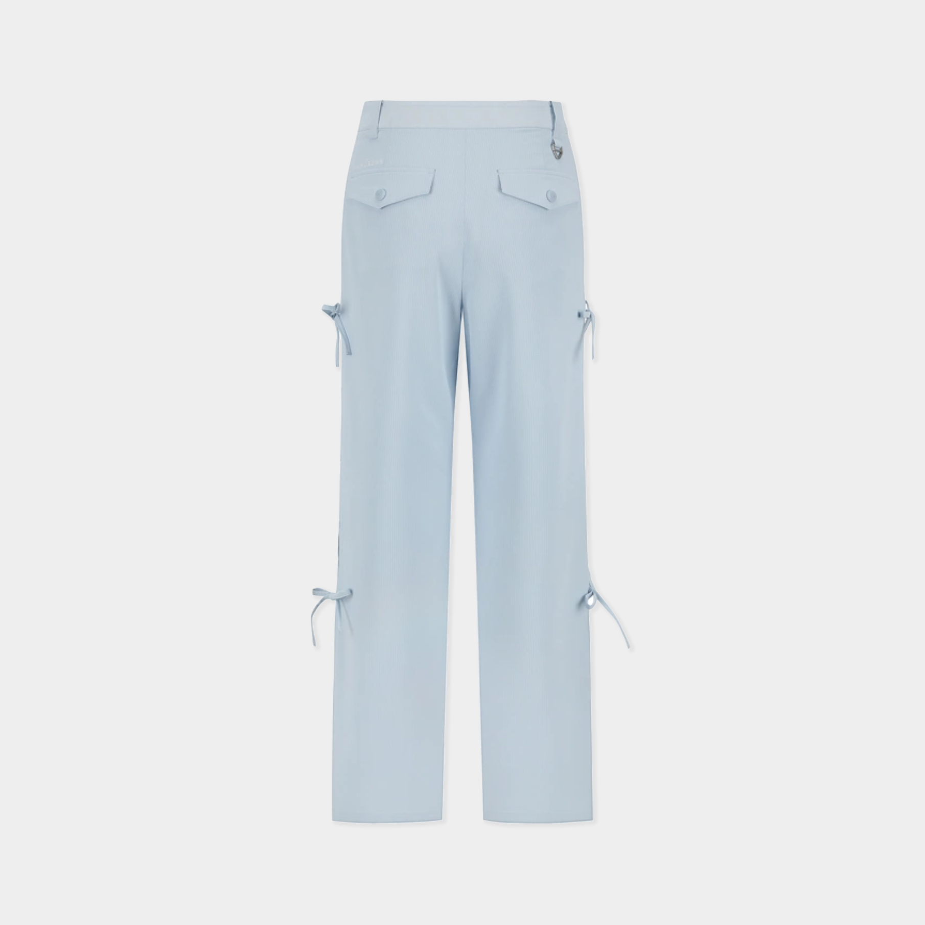 Light blue cropped pants with flap back pockets and side tie details, shown from the back on a light gray background.