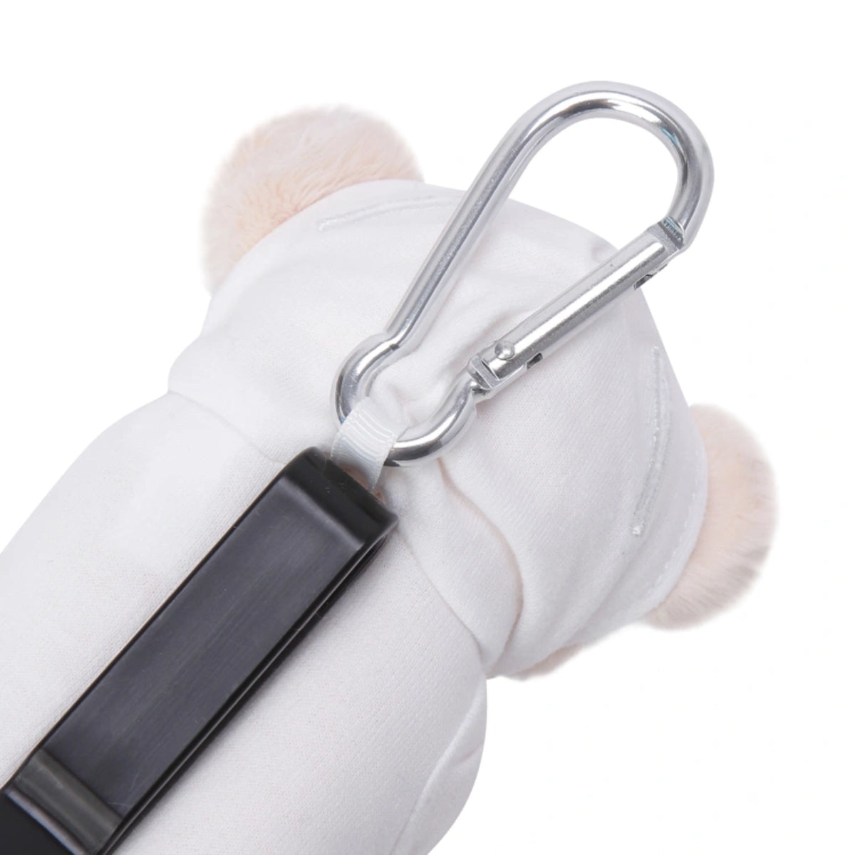 Close-up of a white plush pet accessory with soft ear tufts and a silver metal carabiner attached, shown on a plain white background.