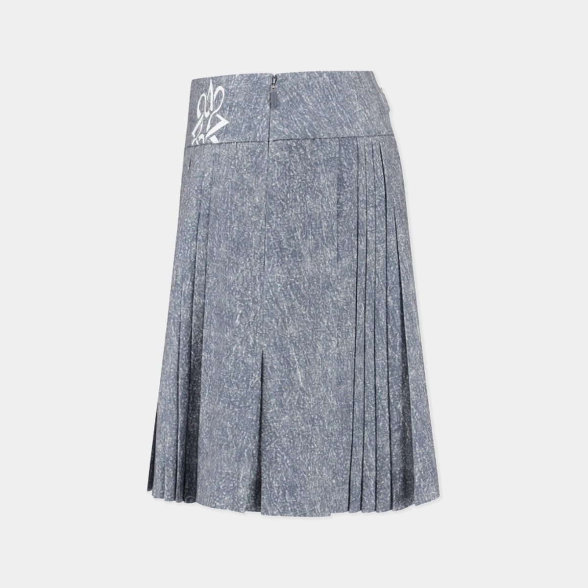 A pleated A-line skirt in a textured slate blue-gray fabric, featuring a white embroidered monogram logo on the left hip, displayed against a light gray background.