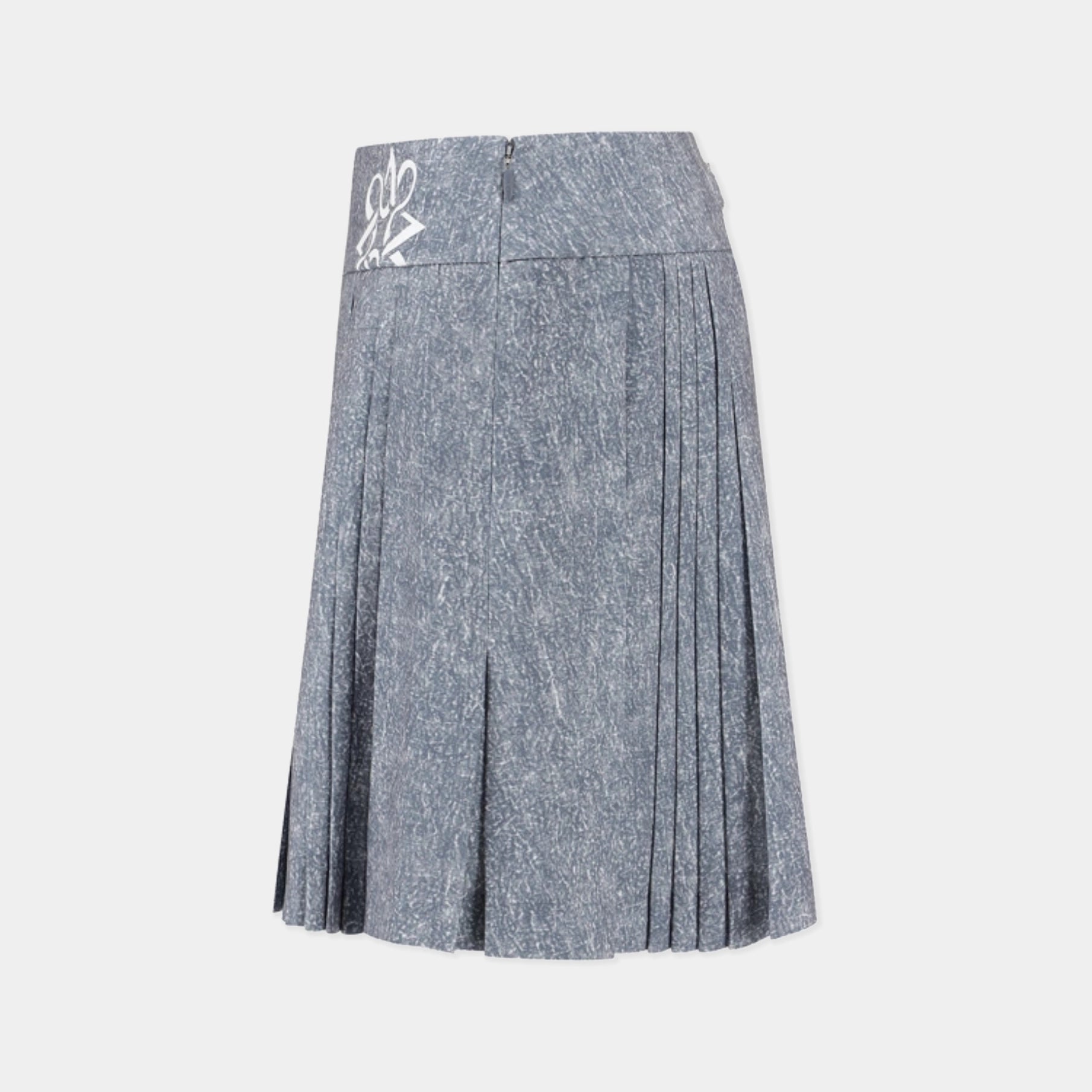 A pleated A-line skirt in a textured slate blue-gray fabric, featuring a white embroidered monogram logo on the left hip, displayed against a light gray background.