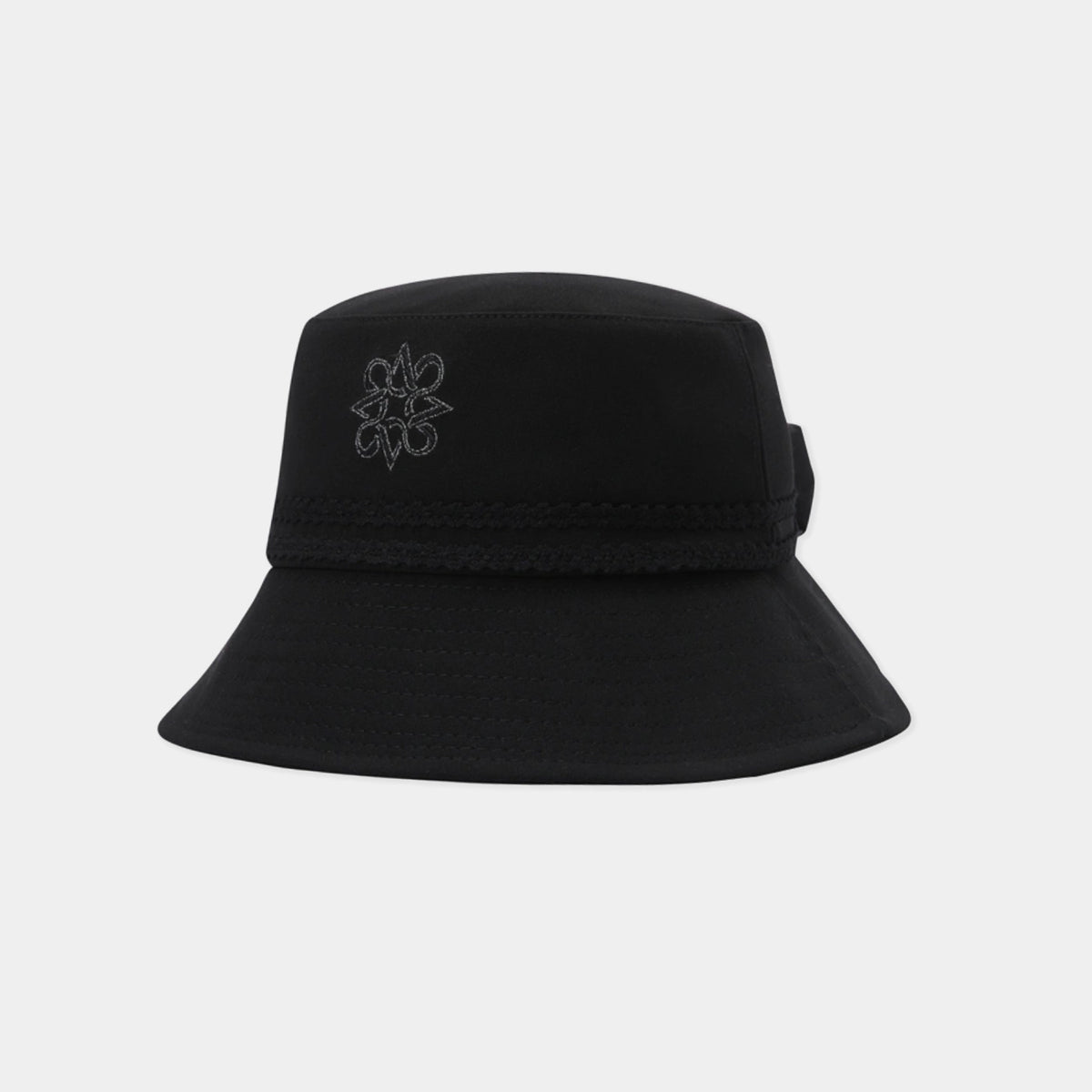 A black bucket hat with a small gray embroidered floral logo on the front, shown against a light gray background.