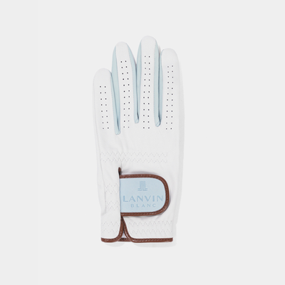 A white golf glove by Lanvin Blanc, featuring light blue perforated finger panels and a light blue brand patch with brown trim, shown against a light gray background.