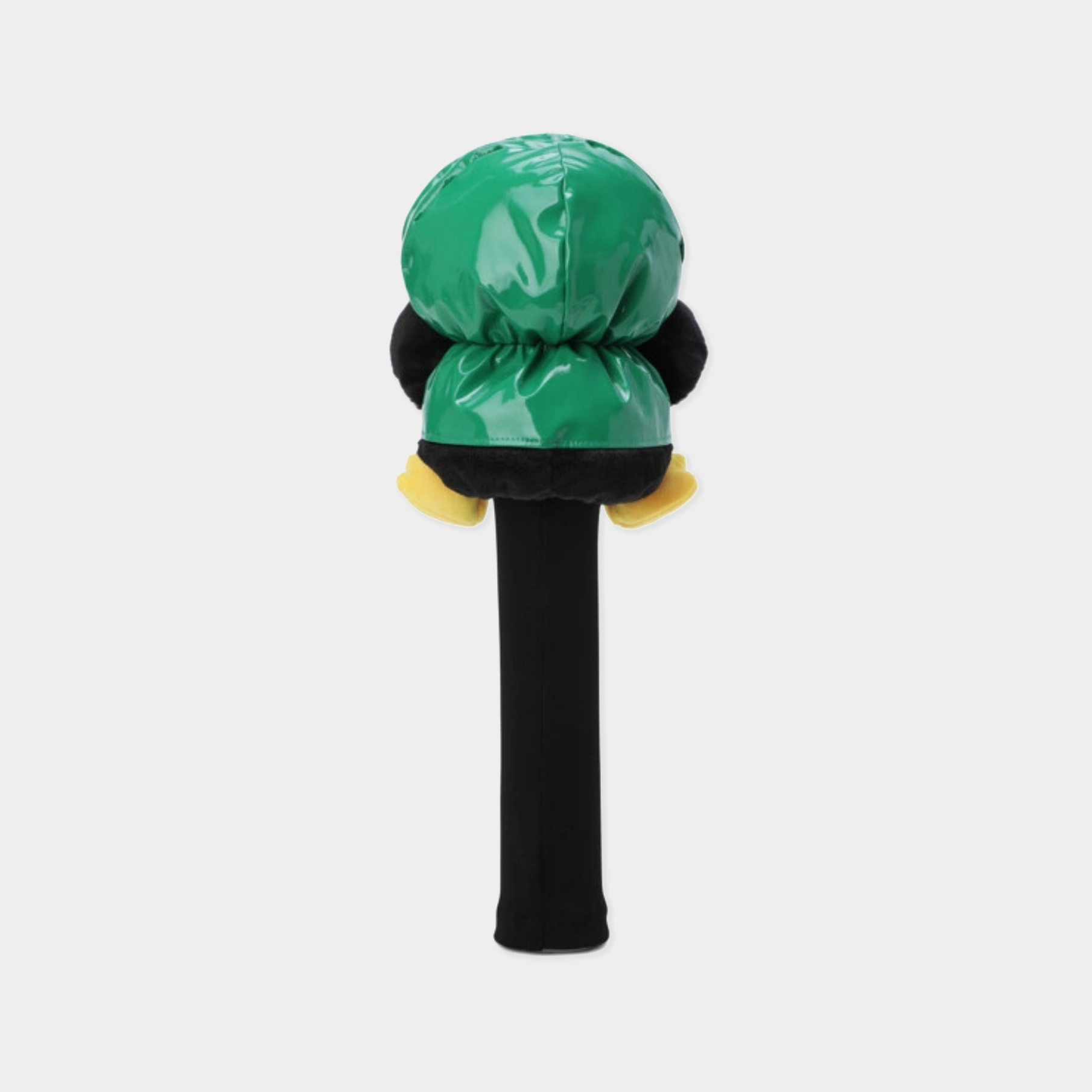 A novelty golf club headcover shaped like a cartoon penguin, featuring a shiny green head, black body, and yellow feet, set against a plain light gray background.