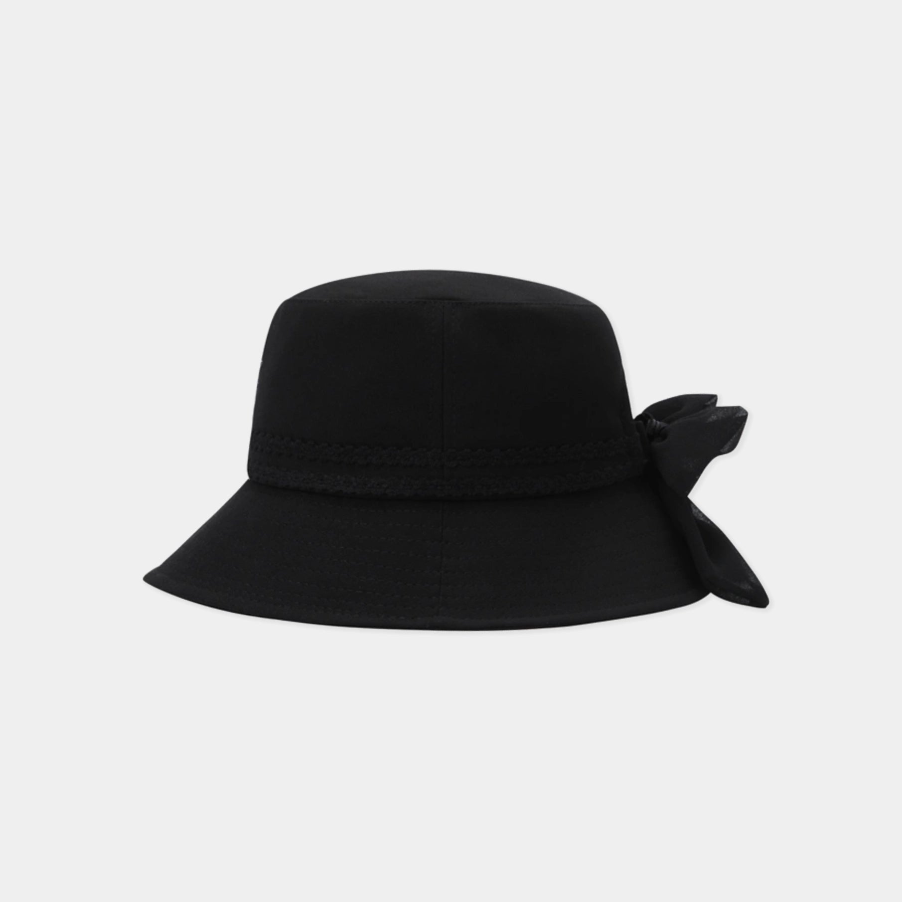A black wide-brim sun hat with a matching fabric bow on the side, displayed against a light gray background.