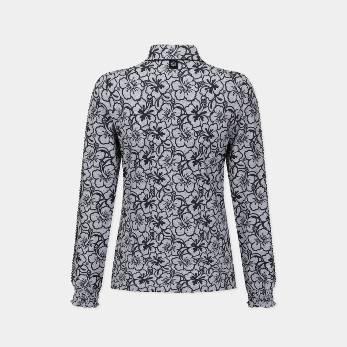 A long-sleeve high-neck blouse with a black floral lace overlay pattern on a light gray base, shown against a plain light gray background.