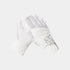 A pair of white equestrian riding gloves by St. Andrews, featuring a silver embroidered monogram logo on the back and a subtle brand name on the wrist strap, set against a light gray background.
