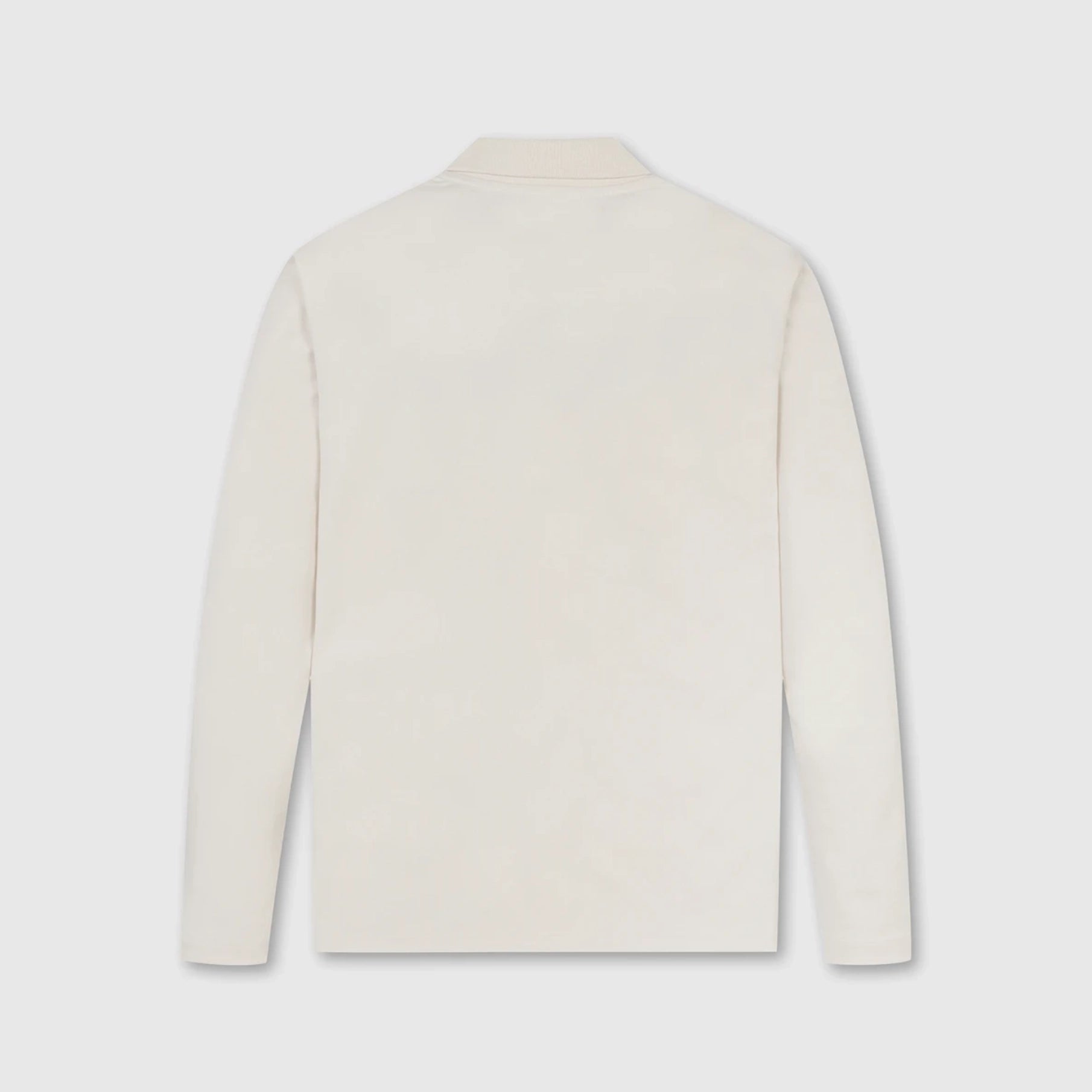 A long-sleeve cream-colored knit top shown from the back, featuring a simple collar and a clean silhouette, set against a light gray background.