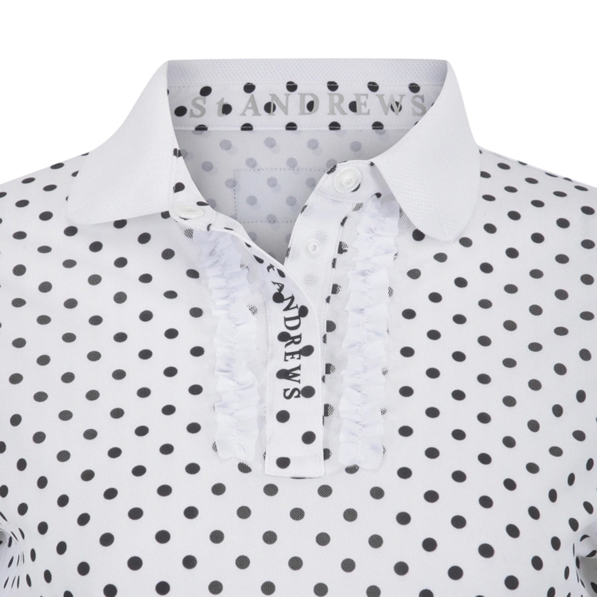 White collared button-up shirt with black polka dots, featuring a ruffled tie-neck detail with the brand name Andrews printed vertically.