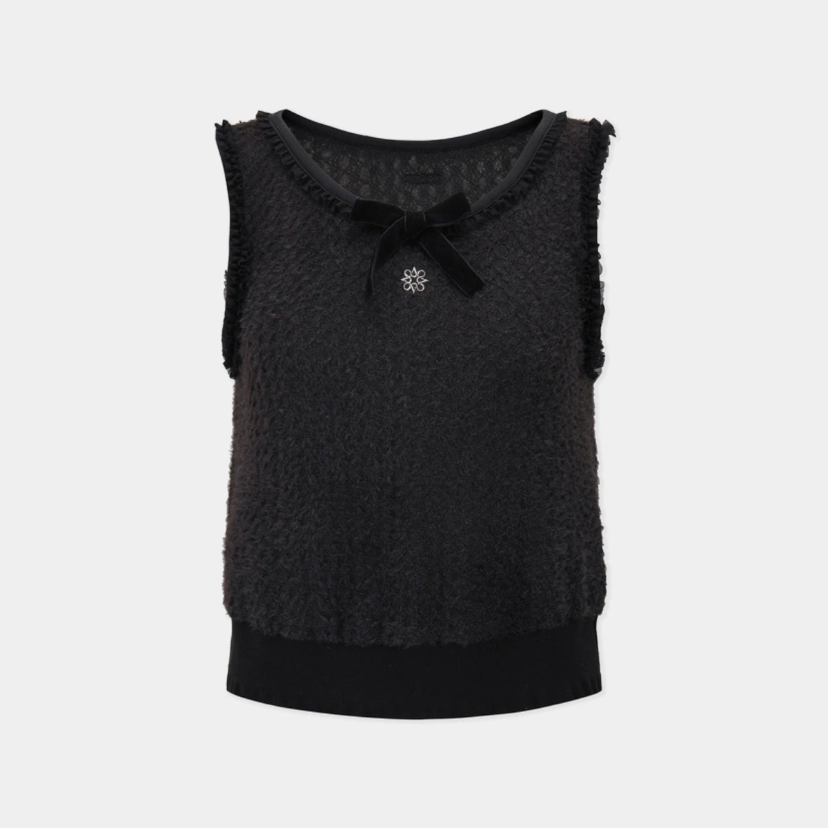 A sleeveless black textured knit top with a bow at the neckline and a small silver floral embellishment, shown against a light gray background.
