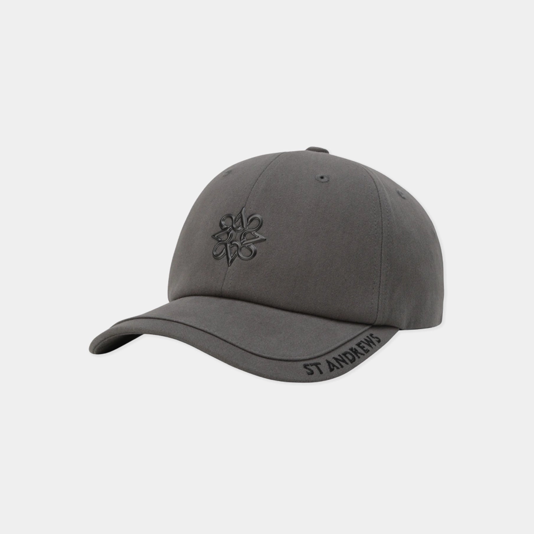 A dark gray baseball cap with a tonal black embroidered St. Andrews flower logo on the front and 'ST ANDREWS' embroidered on the brim, shown against a light gray background.