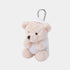 A small plush teddy bear keychain wearing a white diaper, attached to a silver metal carabiner, shown against a light gray background.