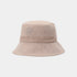 A light beige bucket hat with a subtle floral pattern, a decorative braided band, and a small embroidered flower on the side, shown against a plain light gray background.