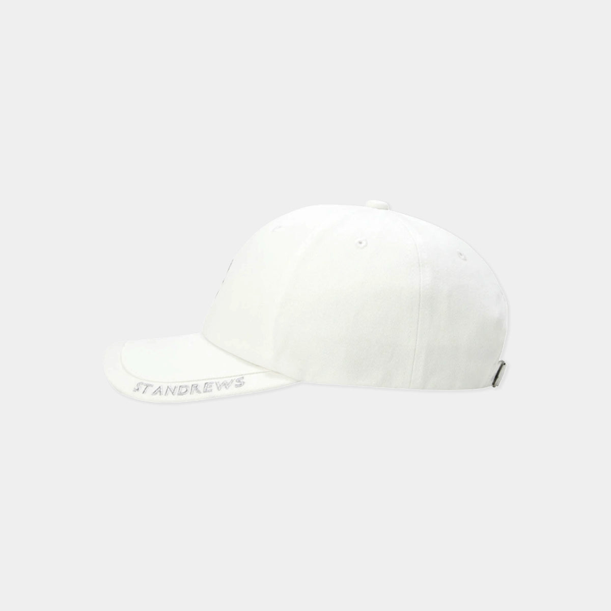 A white structured baseball cap with 'STANDREWS' embroidered in gray on the brim, shown from a side profile against a light gray background.