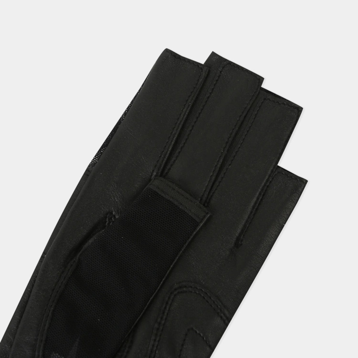 A close-up of a black leather glove with a textured fabric cuff and hook-and-loop strap closure, shown on a light gray background.