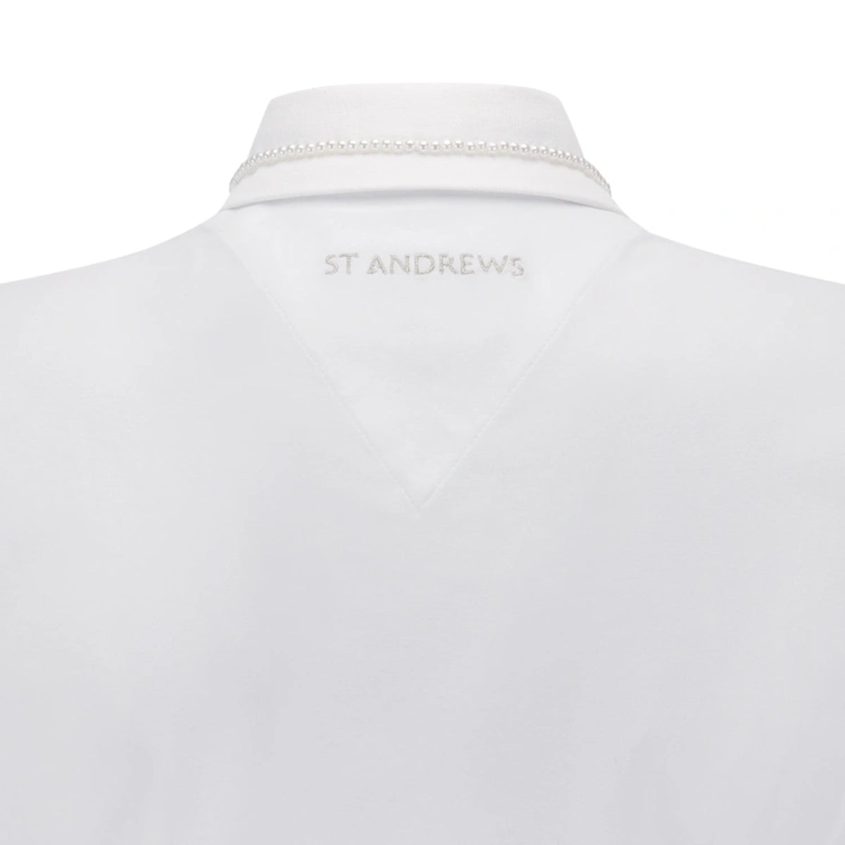 Close-up back view of a white collared shirt with a pearl-like beaded collar trim and 'ST ANDREWS' embroidered in gray at the inner neck.