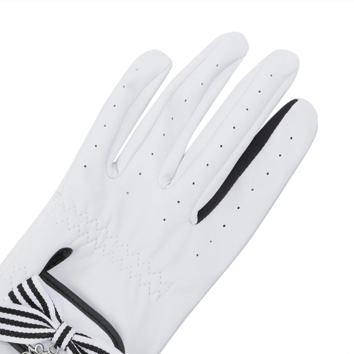 A white golf glove with black trim and a black-and-white striped wrist strap, shown on a plain white background.
