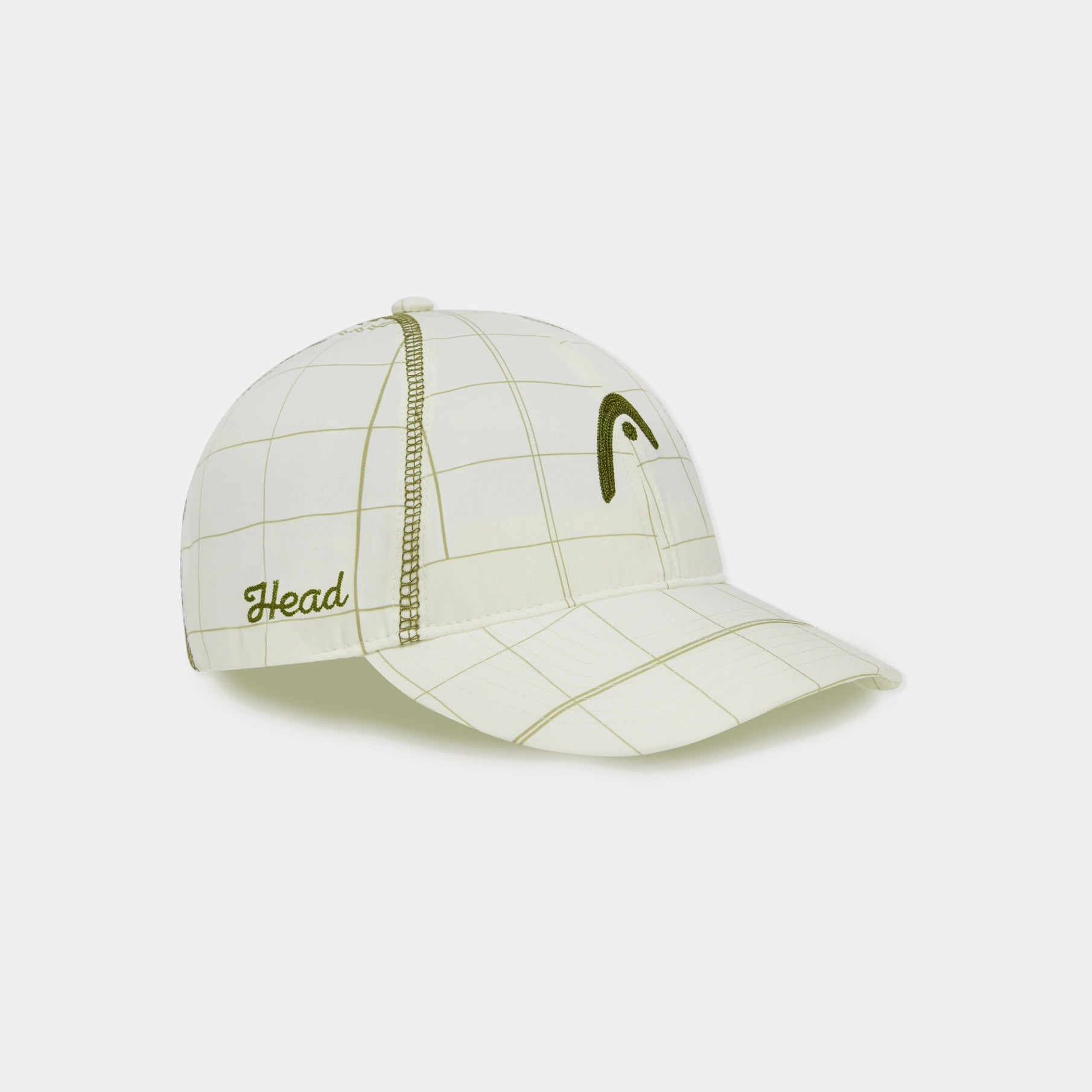 A structured baseball cap by Head, featuring a cream-colored grid pattern with olive green accents, including a stylized head logo on the front and 'Head' script on the side.
