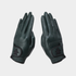 A pair of dark forest green leather golf gloves shown flat against a light gray background, displaying the back of the hands with stitched details and a logo patch on the back of the wrist.