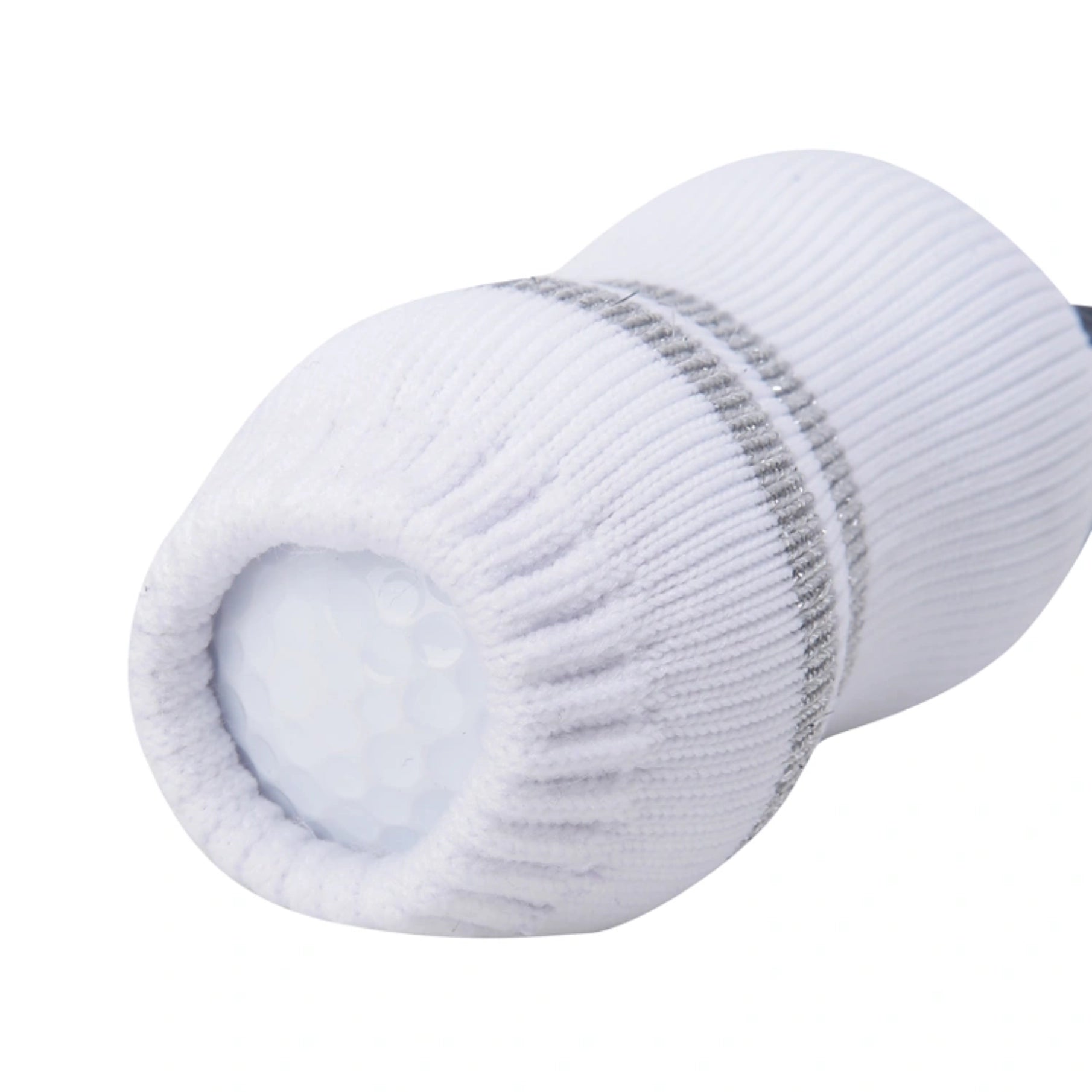A close-up of a white golf club headcover made of ribbed knit fabric with a silver-gray stripe detail, fitted over a golf ball on a white background.