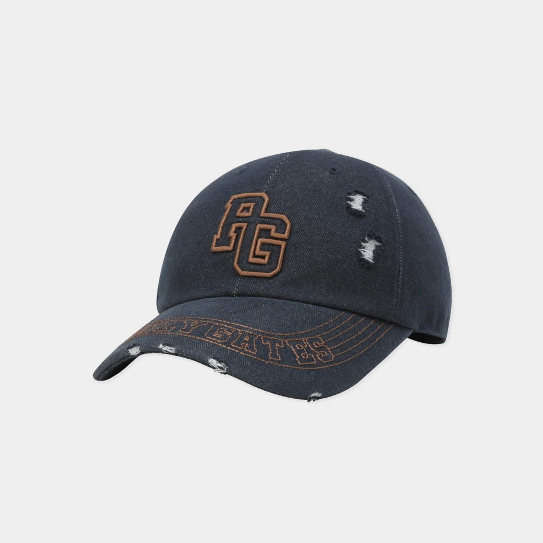 A distressed dark navy baseball cap with a brown embroidered 'AG' logo on the front and 'AGATE' text on the brim, featuring intentional frayed details.