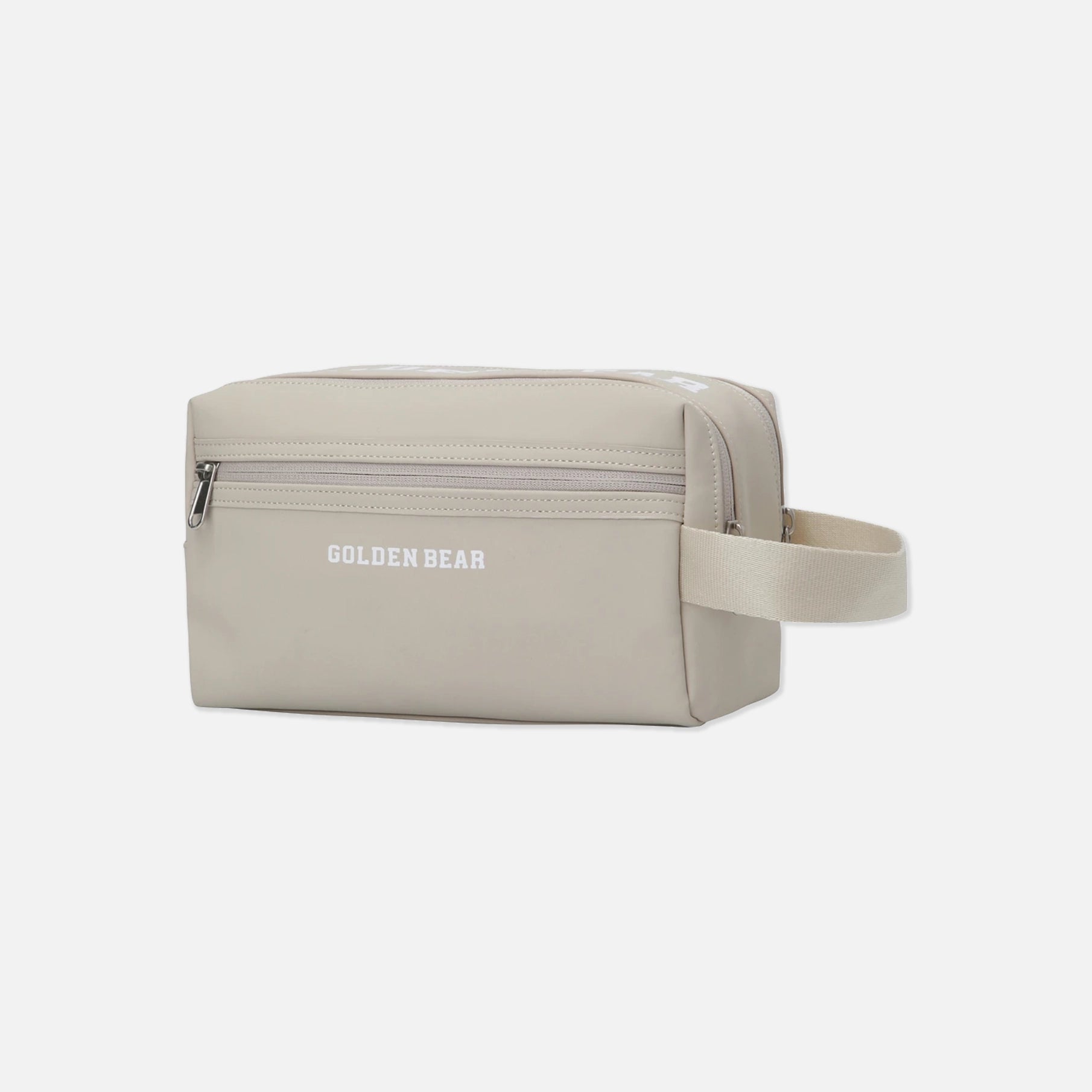A light beige toiletry bag with a top zipper, featuring the brand name 'GOLDEN BEAR' printed in white on the front, set against a solid light gray background.