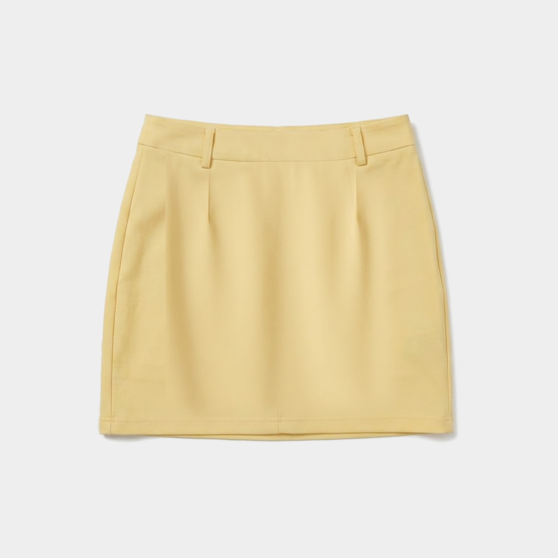 A light yellow pleated mini skirt with a structured waistband, shown flat against a light gray background.
