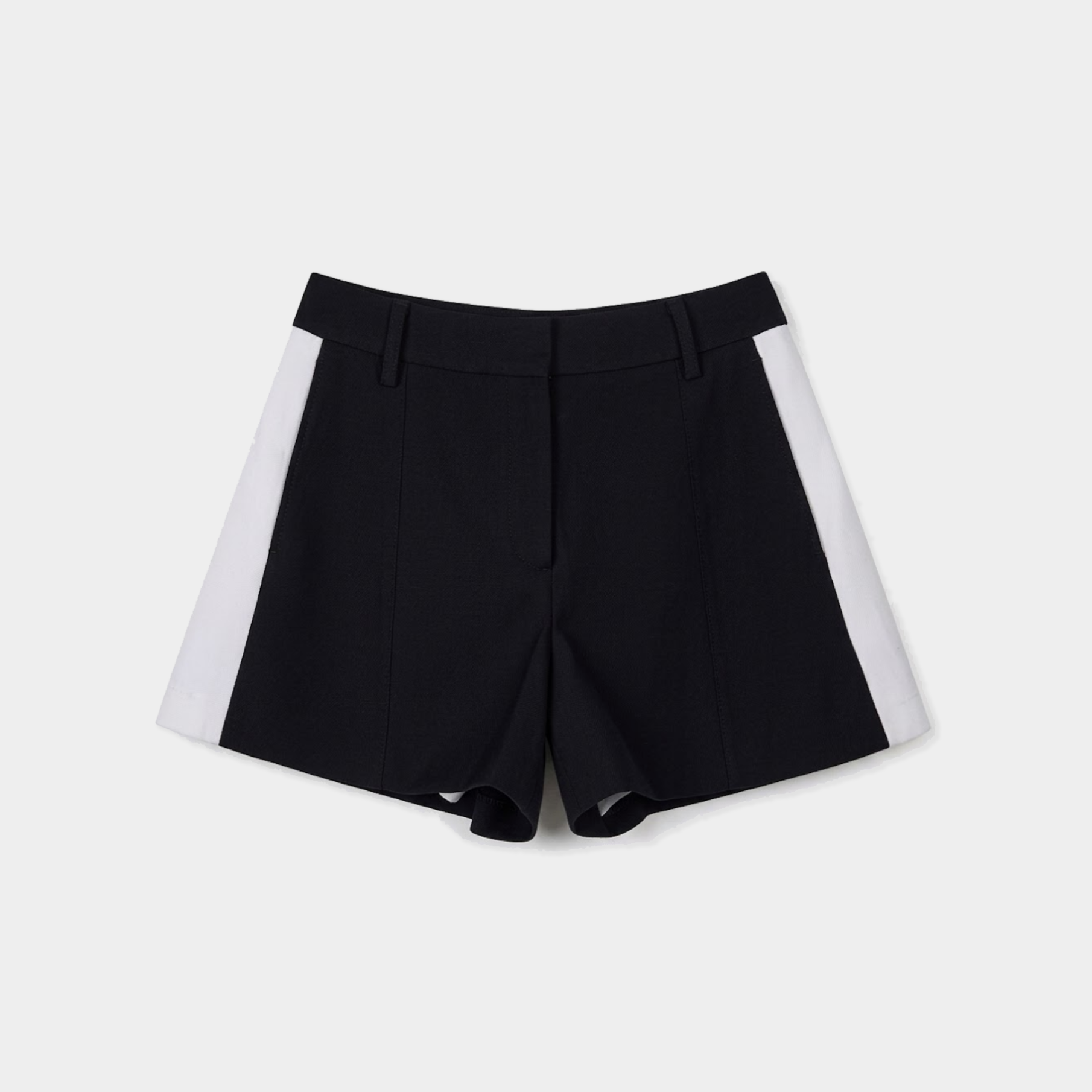 Black tailored shorts with contrasting white side panels, shown flat against a light gray background.
