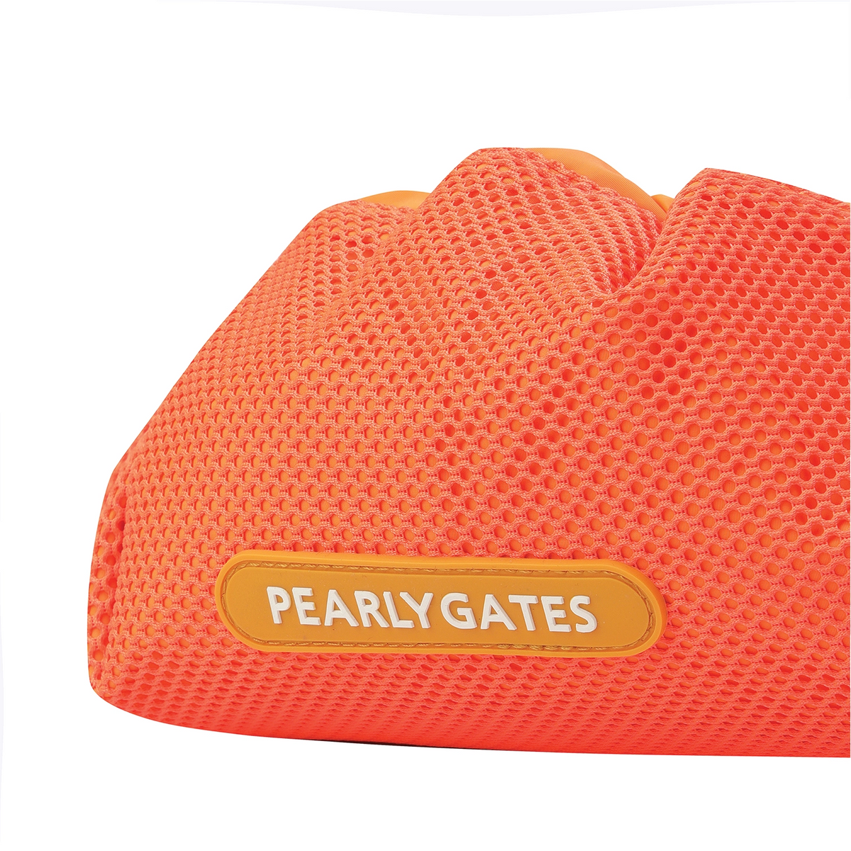 Close-up of a bright orange mesh-covered product with a tan label reading PEARLYGATES on a white background.