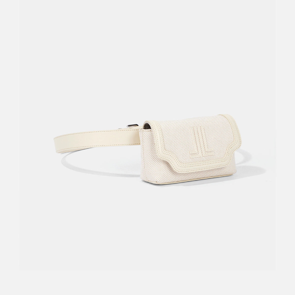 An off-white textured faux-leather waist bag with a matching adjustable strap and a debossed logo on the front flap, shown on a light gray background.