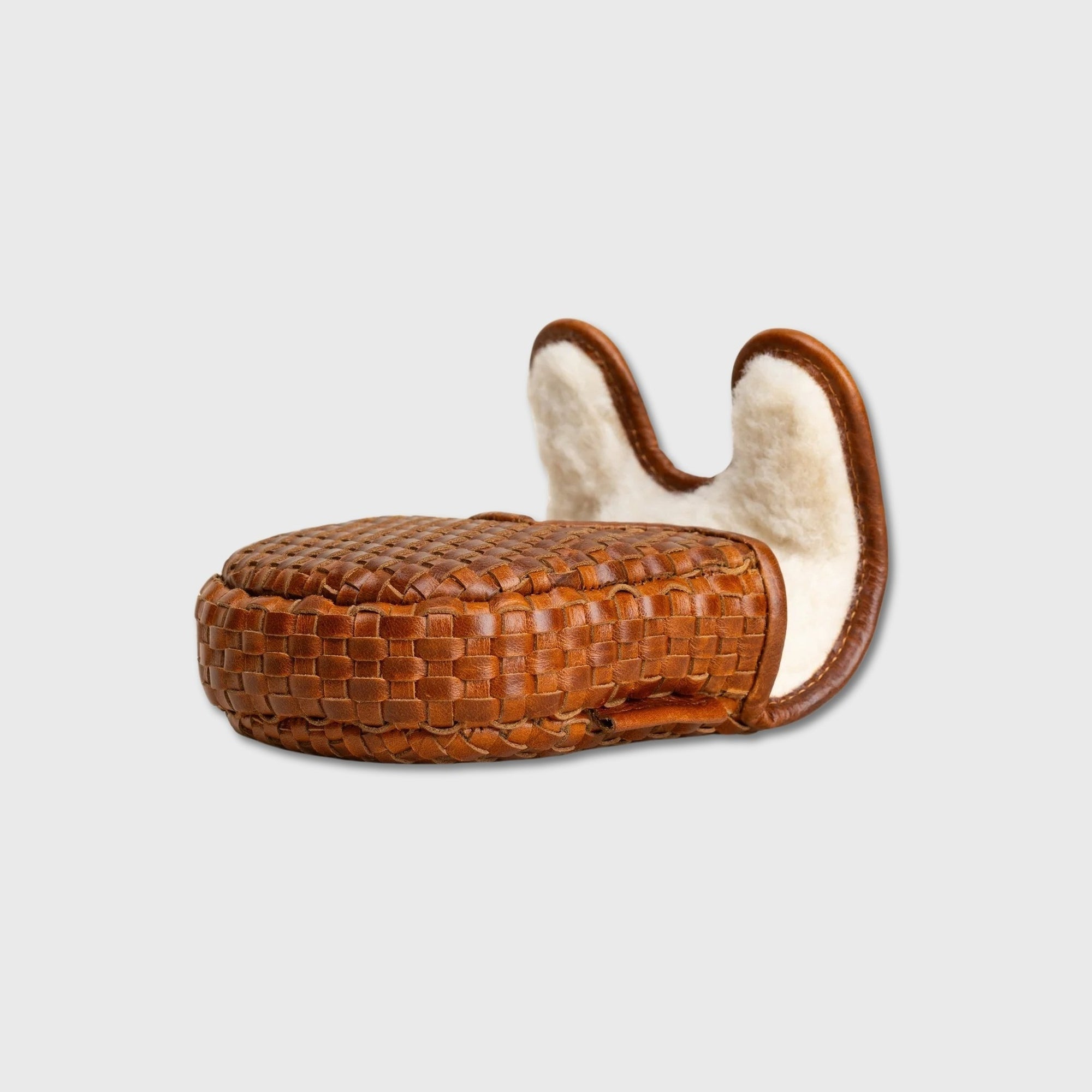 A brown woven leather DF3 Putter Cover with a cream-colored fleece lining, shown against a light gray background.