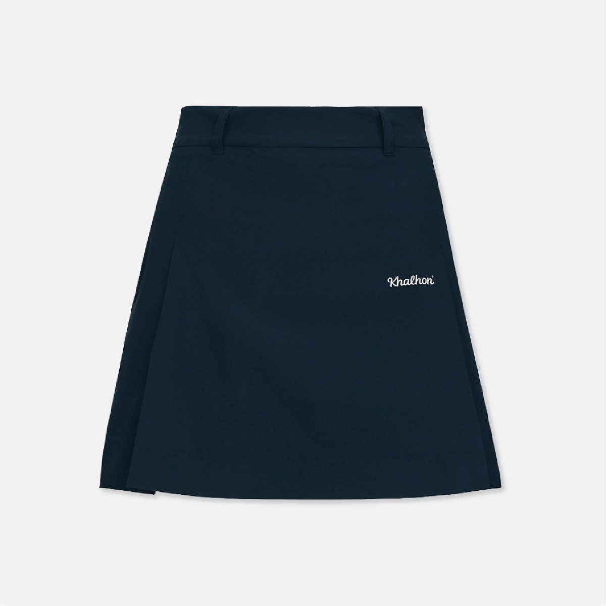 A dark navy blue pleated skirt with a small white embroidered script logo on the left side, displayed flat against a light gray background.