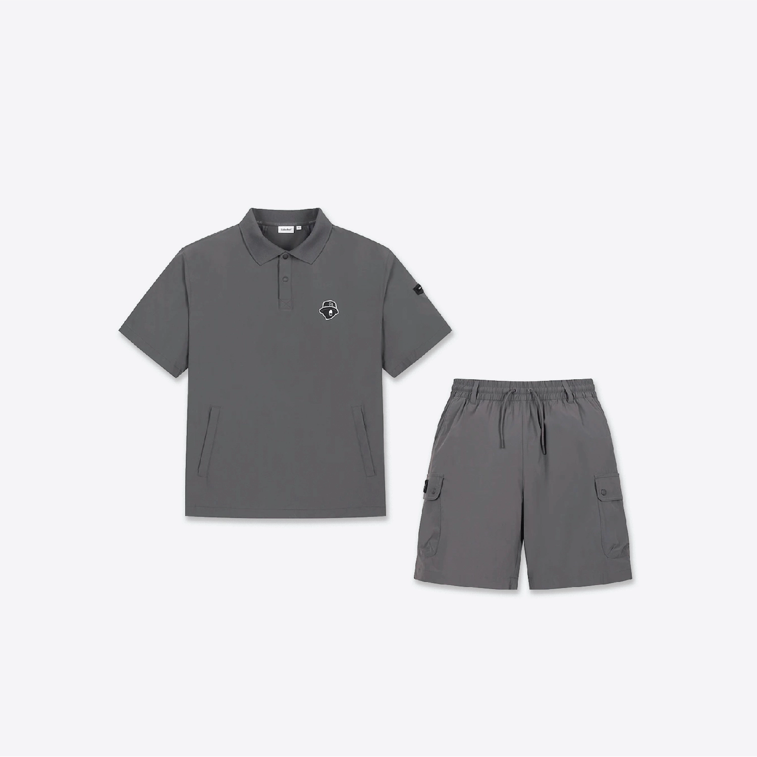 A two-piece gray clothing set consisting of a short-sleeve polo shirt with a small chest logo and matching cargo shorts with a drawstring waist, displayed on a clean white background.