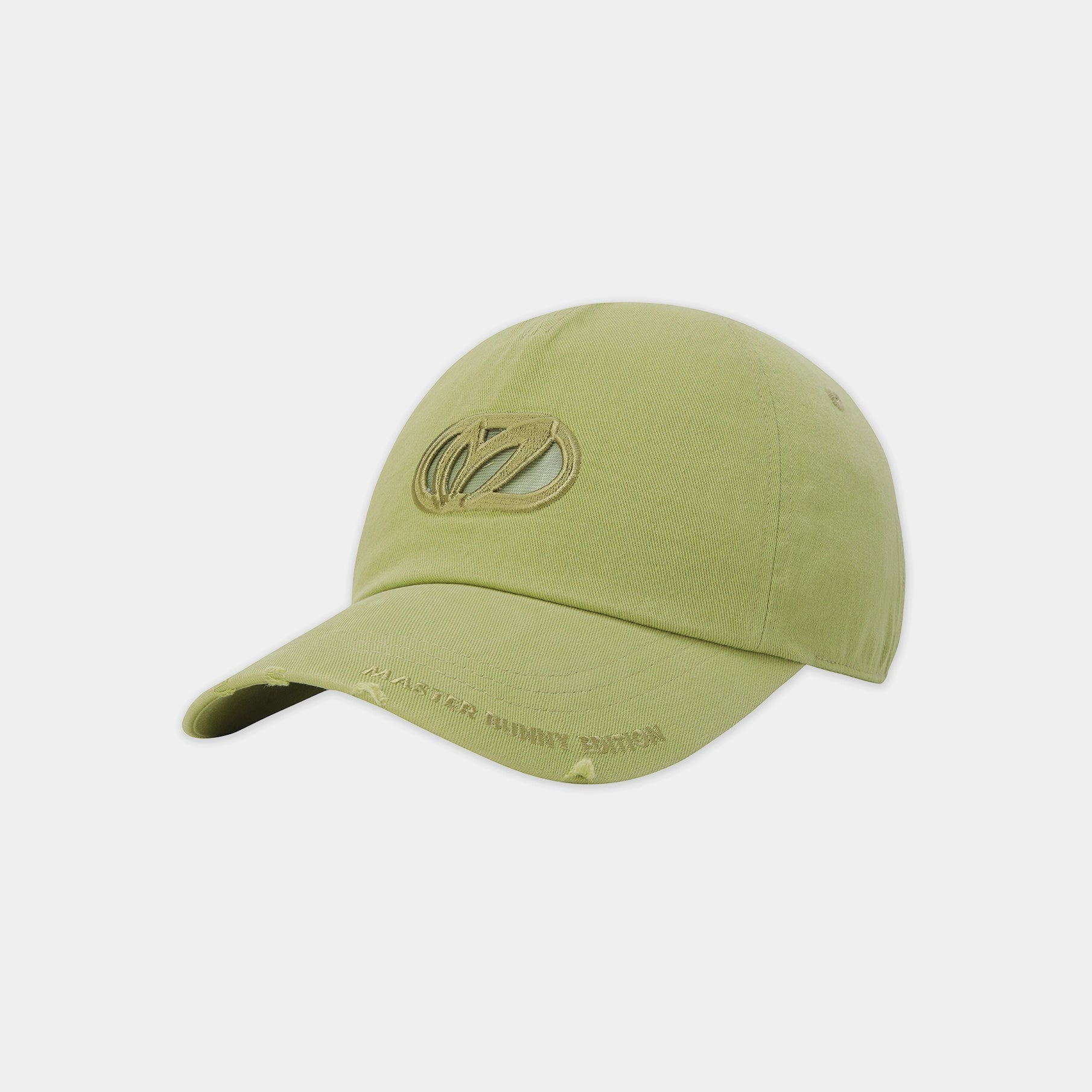 A light olive green baseball cap with a tonal embroidered logo on the front and distressed details on the brim, shown against a light gray background.