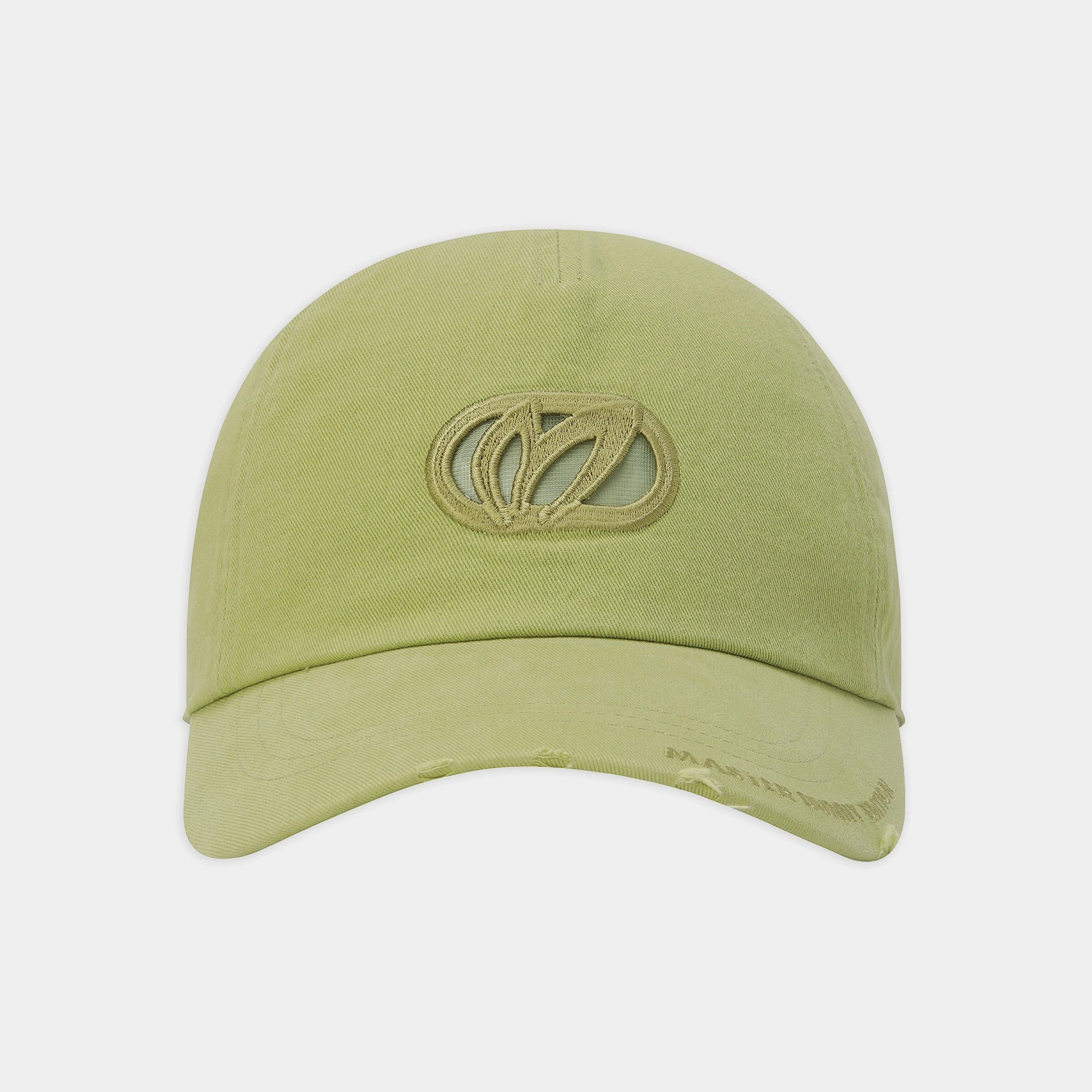 A light olive green baseball cap with a distressed brim and a matching embroidered logo on the front, shown against a plain light gray background.