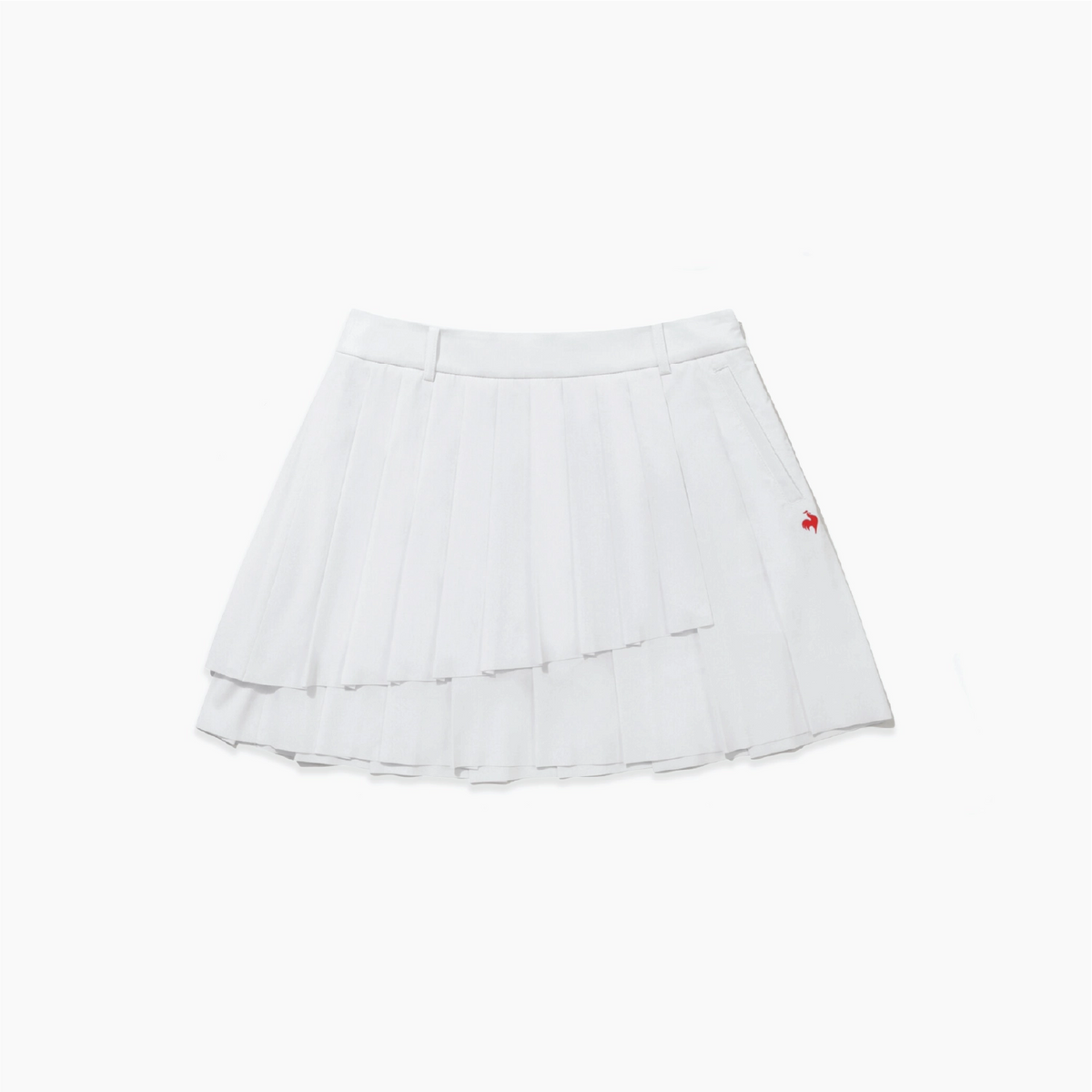 A white pleated tennis skirt with a small red embroidered logo on the side, displayed against a clean white background.