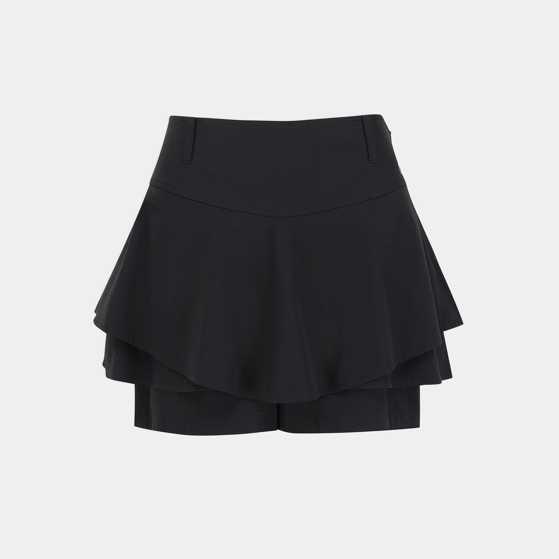 A black high-waisted athletic mini skirt with a layered ruffle design, shown flat against a light gray background.